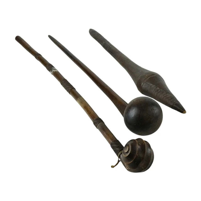 An Aboriginal fighting club or waddi. Length 66cm. Together ...