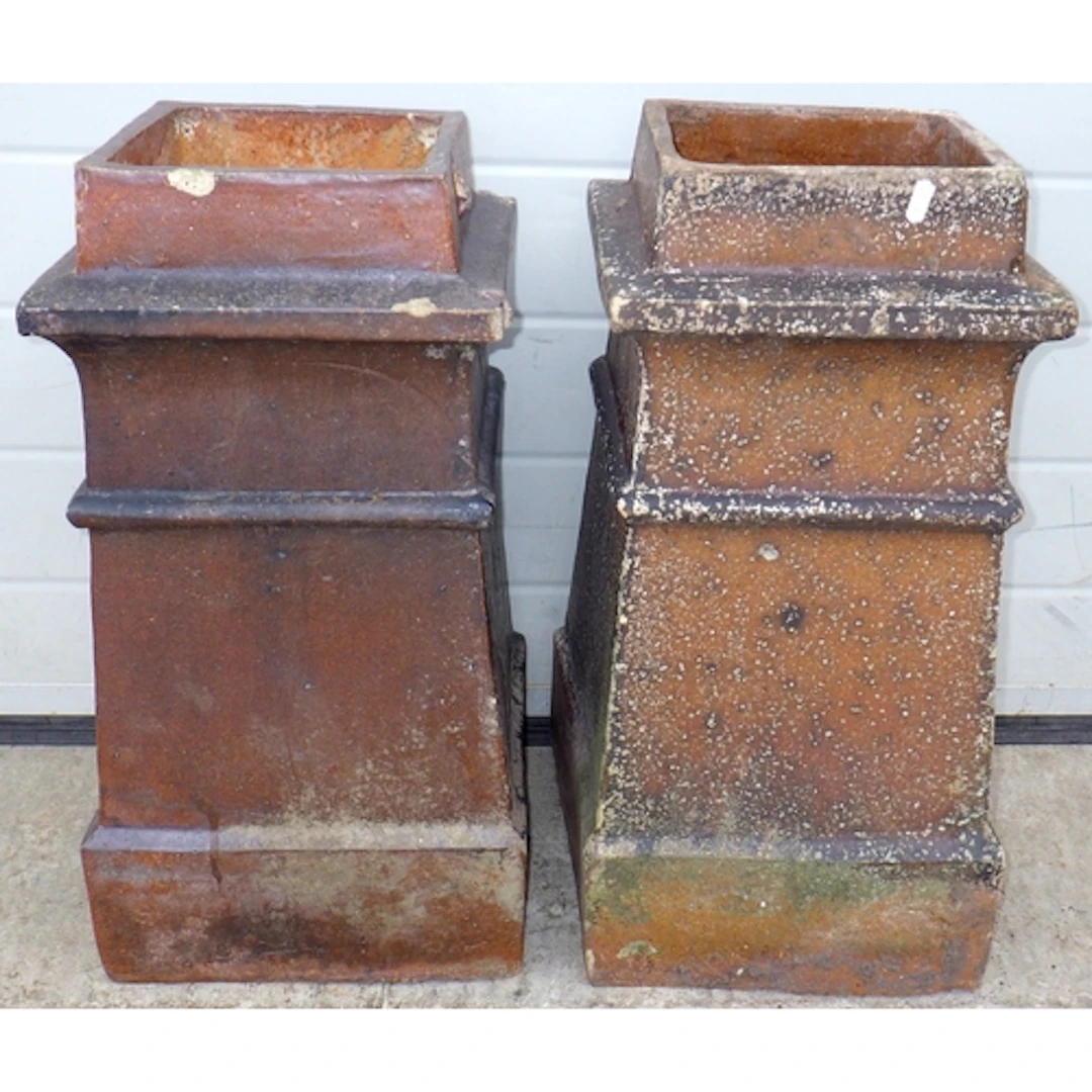 Two square chimney pots, chips, tallest 60cm tall