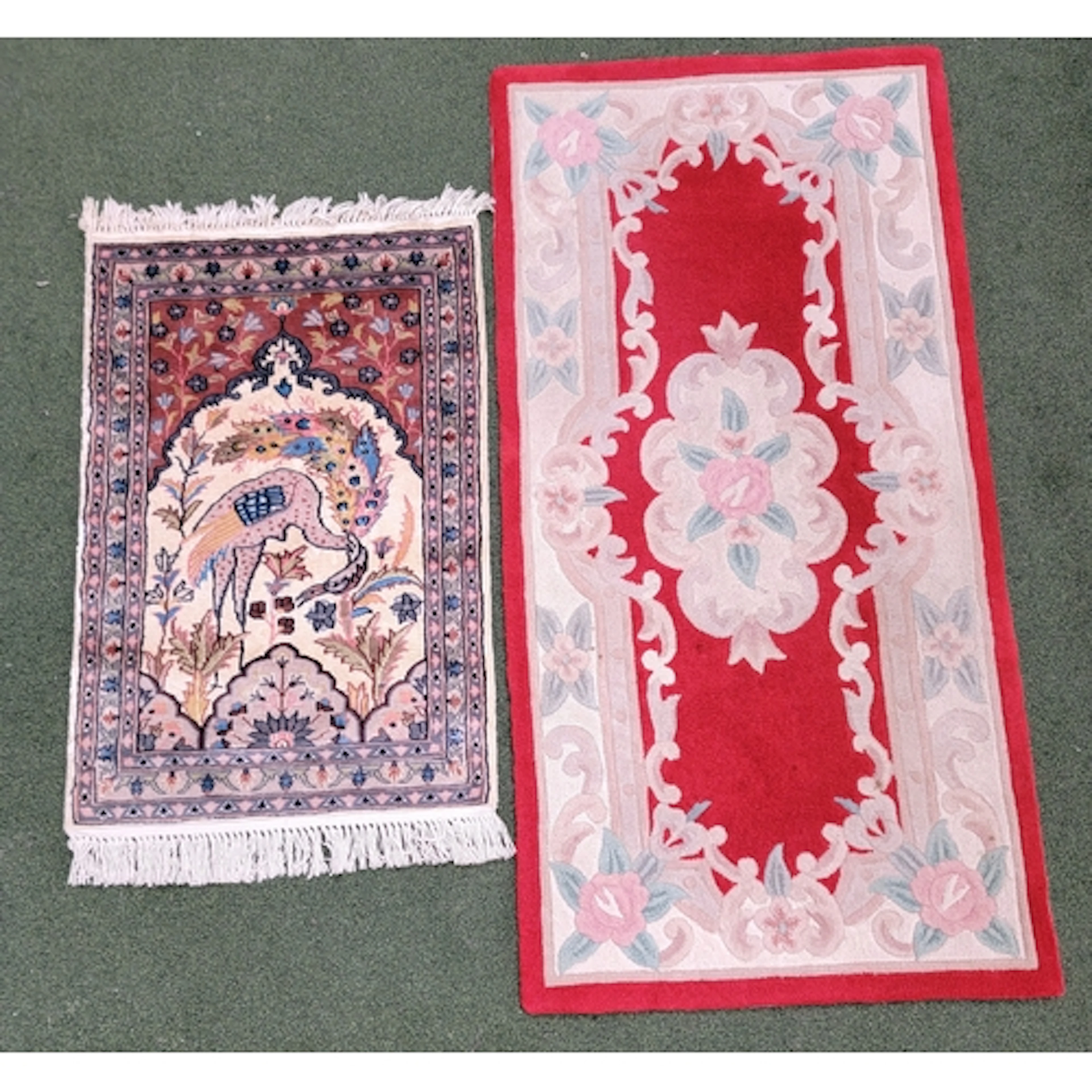 PAIR OF VINTAGE RUGS comprising a pictorial example with cen...