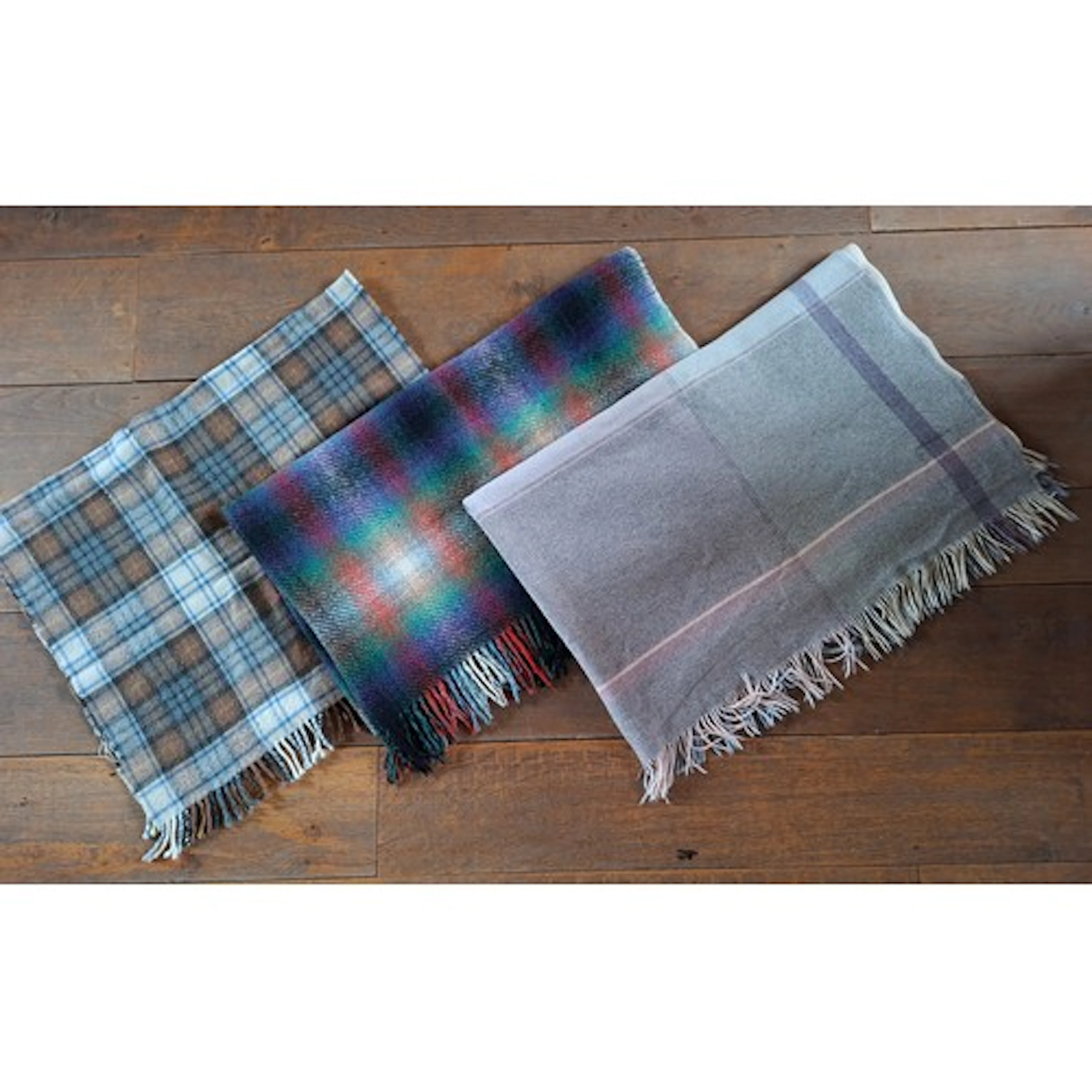 Three 20th Century wool rugs comprising a British Whitley Wi...