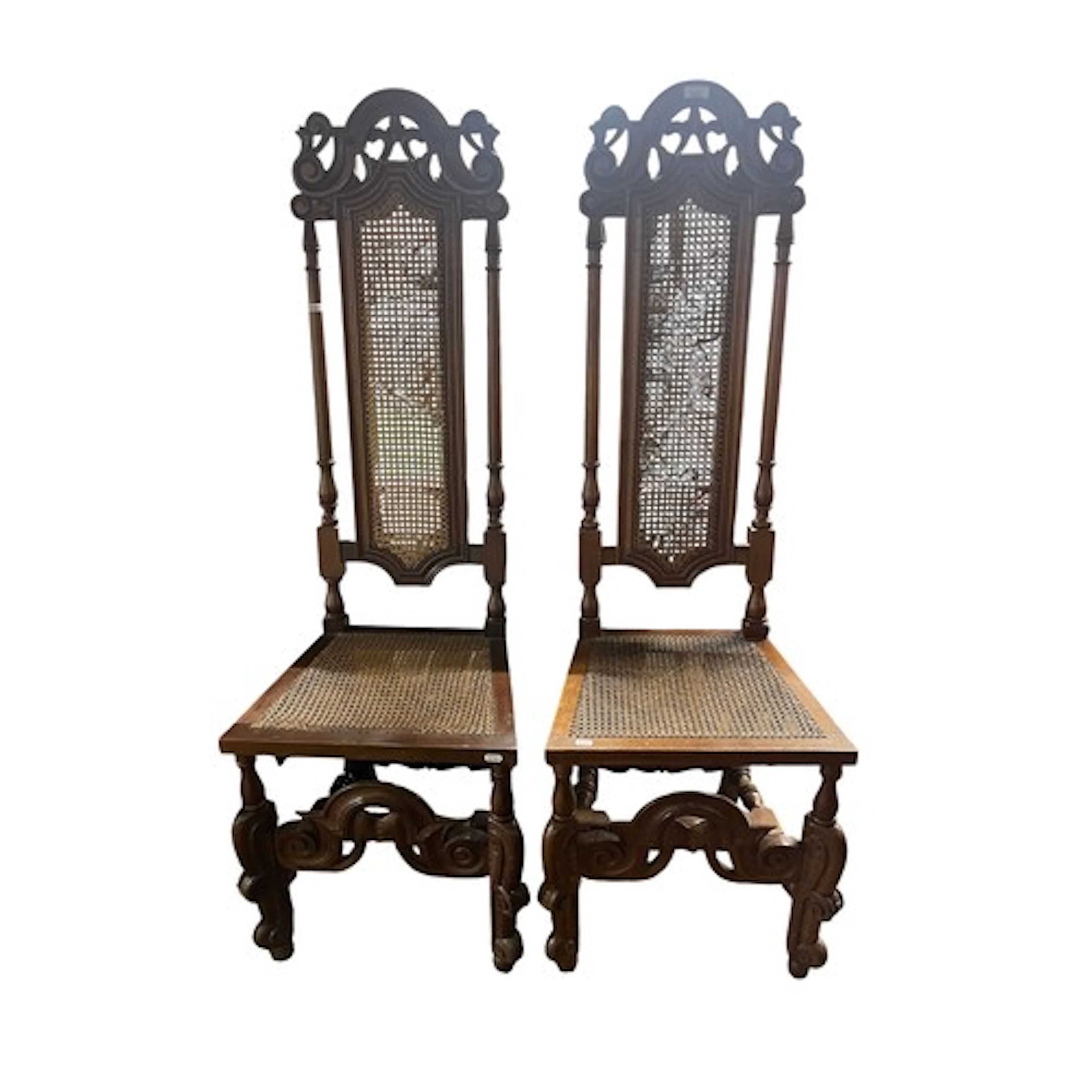 Pair of Carolean style high back hall chairs.
