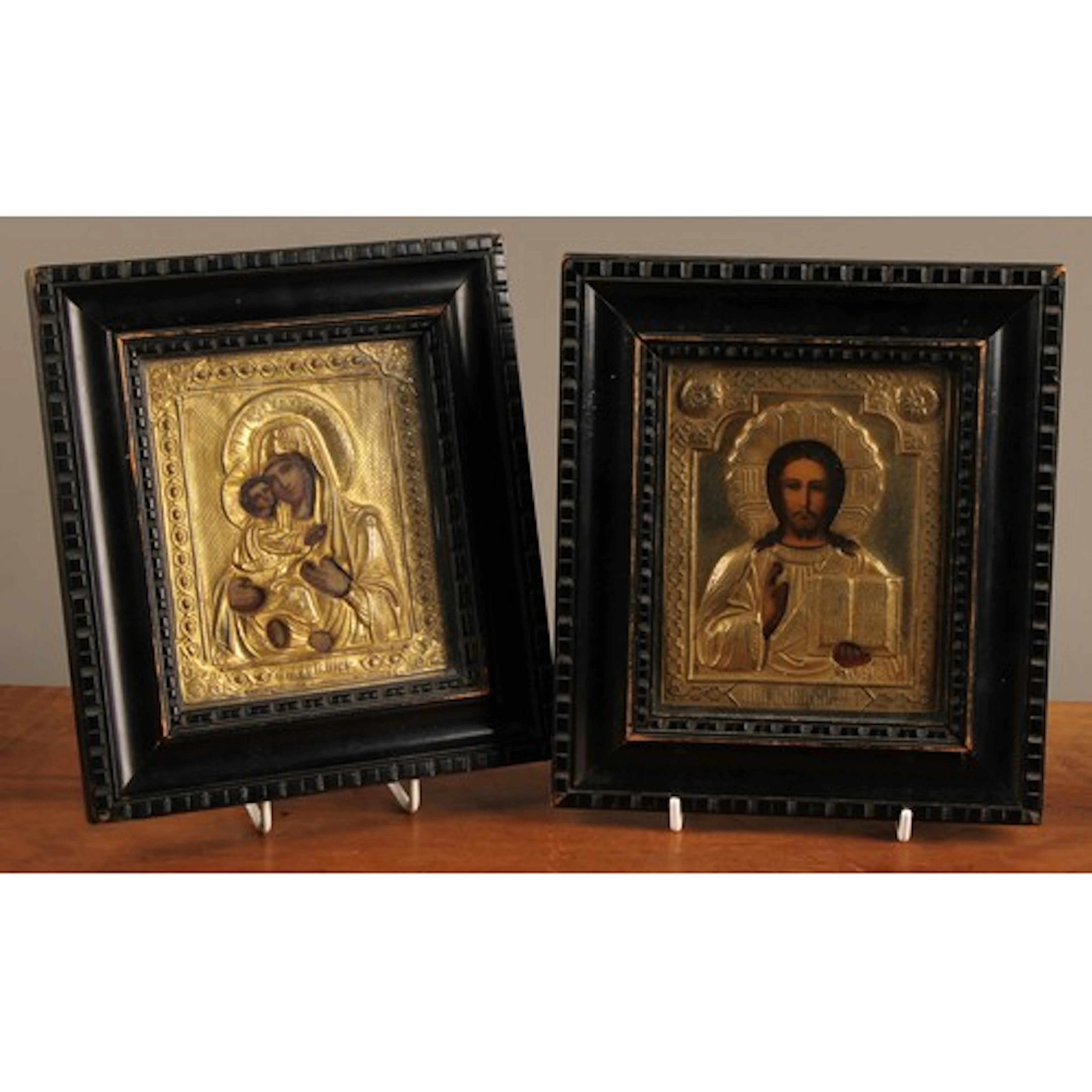 A pair of Eastern Orthodox icons, painted with Christ Pantoc...