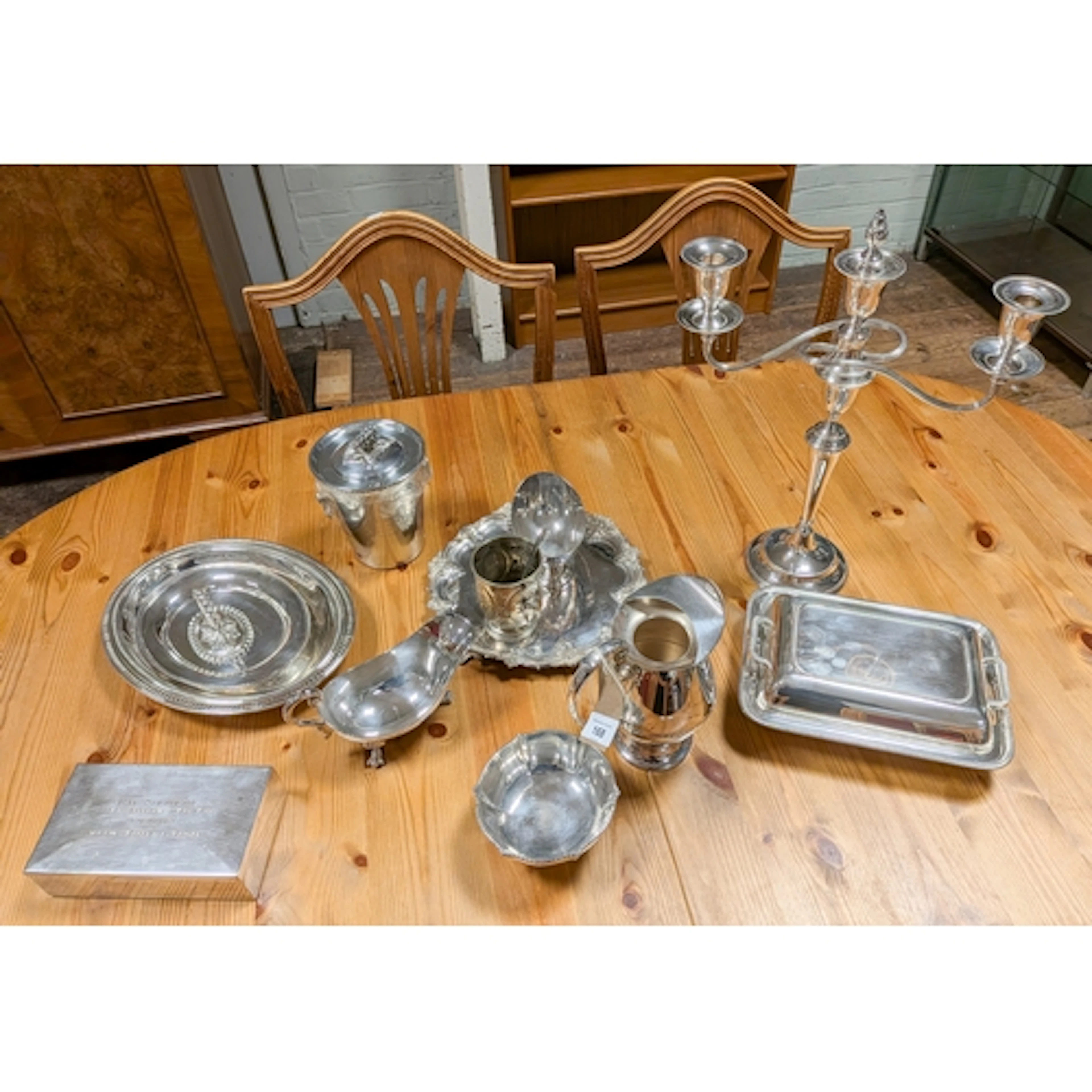 Two silver plated entrée dishes together with a large three ...