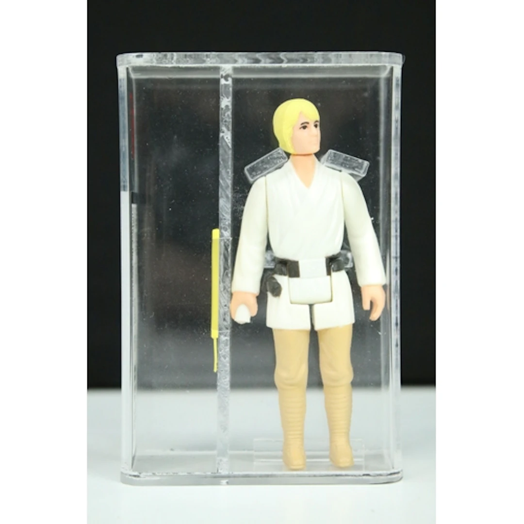 Star Wars - UKG graded cased Luke Skywalker figure with acce...