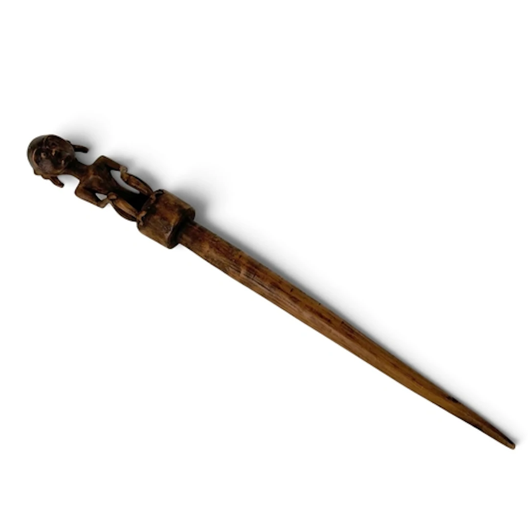 AN AFRICAN TRIBAL CARVED WOODEN STAFF/STAKE In the form of a...