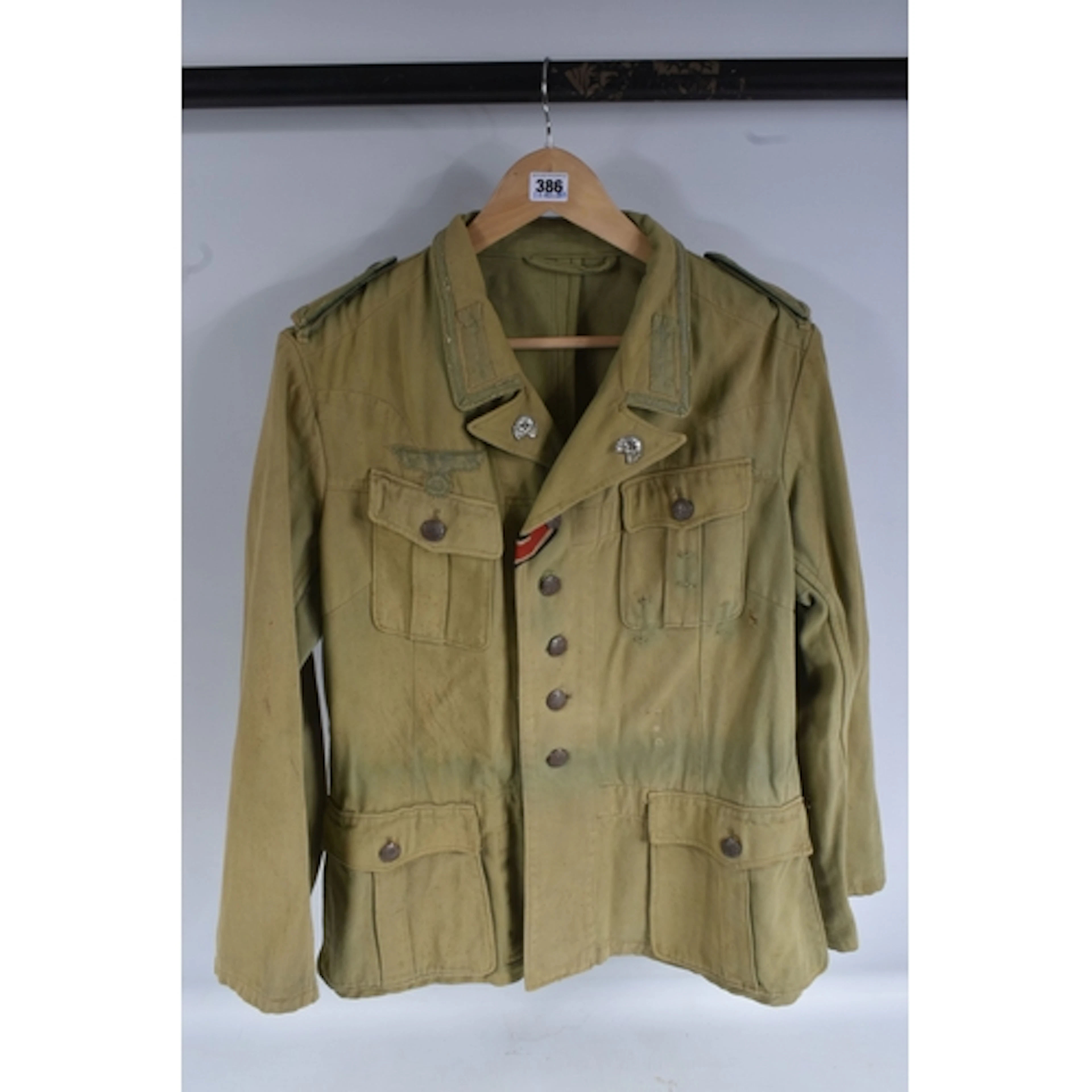 A GERMAN ARMY TROPICAL TUNIC FOR A NCO, this would have poss...