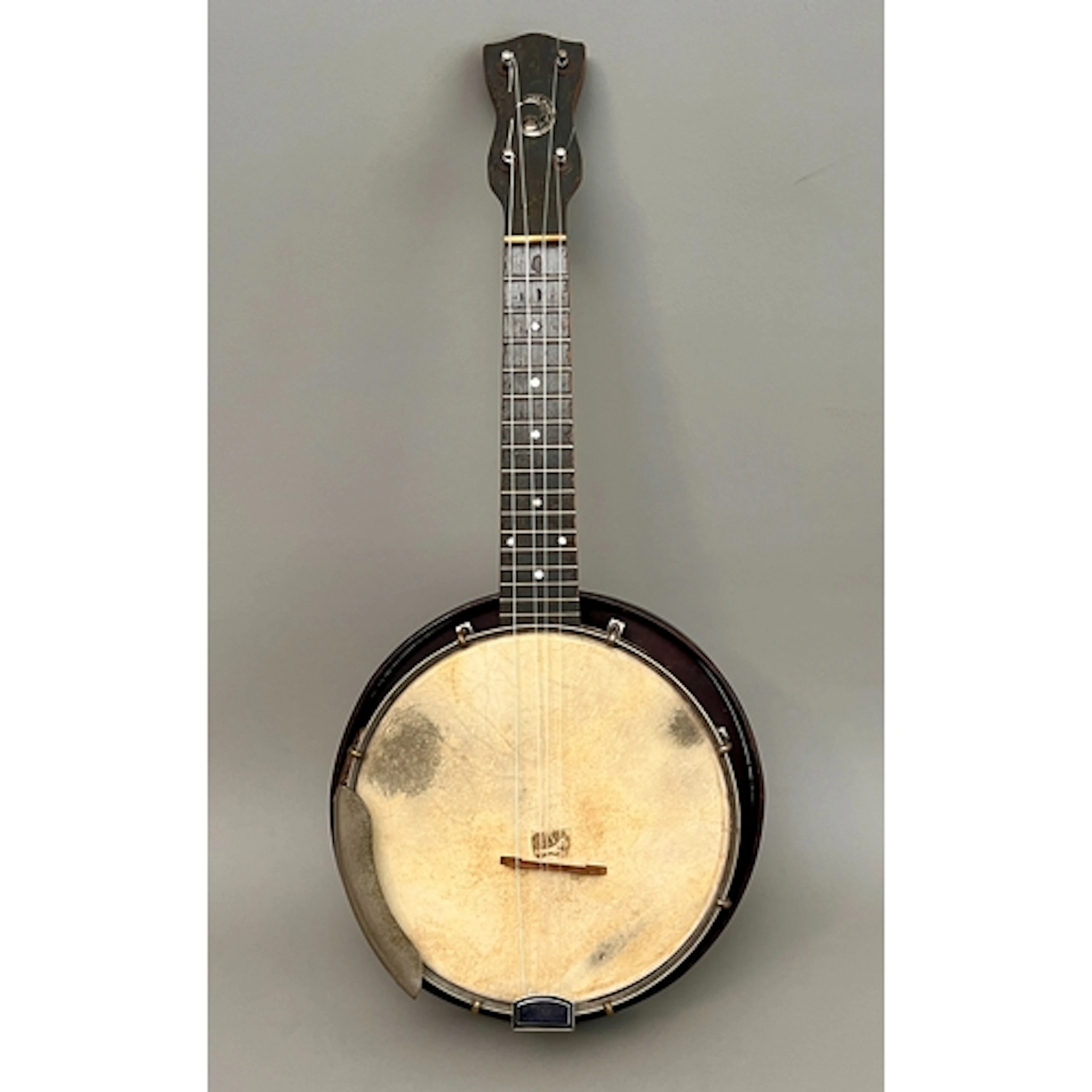 A vintage Windsor 'The Whirle' four-string banjo ukulele, 19...