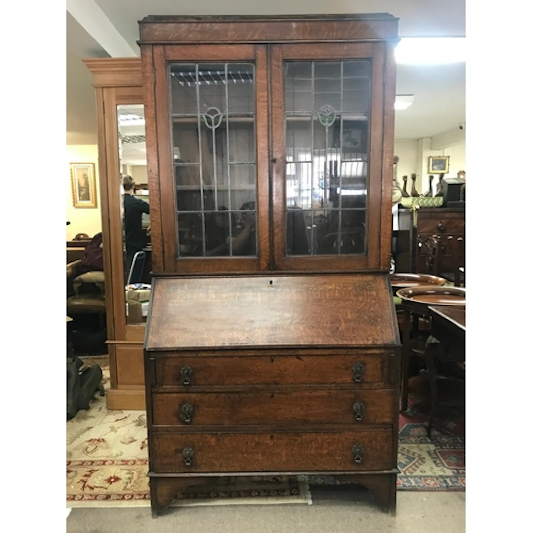 An oak bureau bookcase featuring stained glass doors. 100cm ...