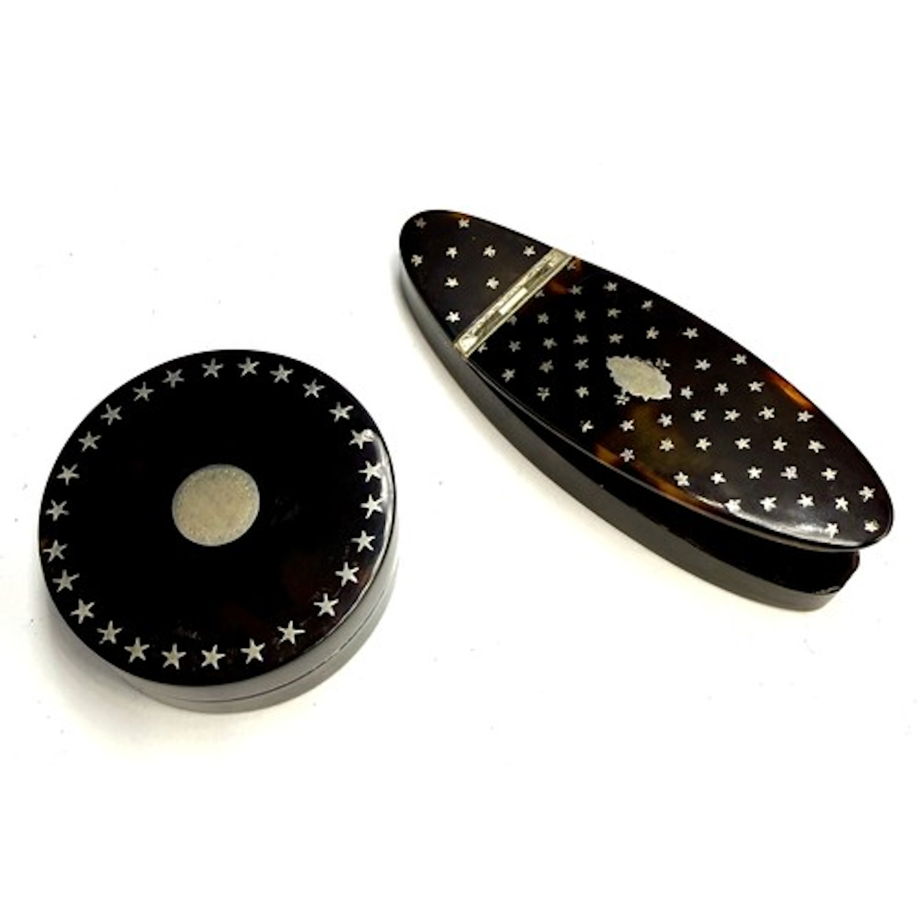 Two 19thC tortoiseshell silver pique snuff boxes. The oval o...