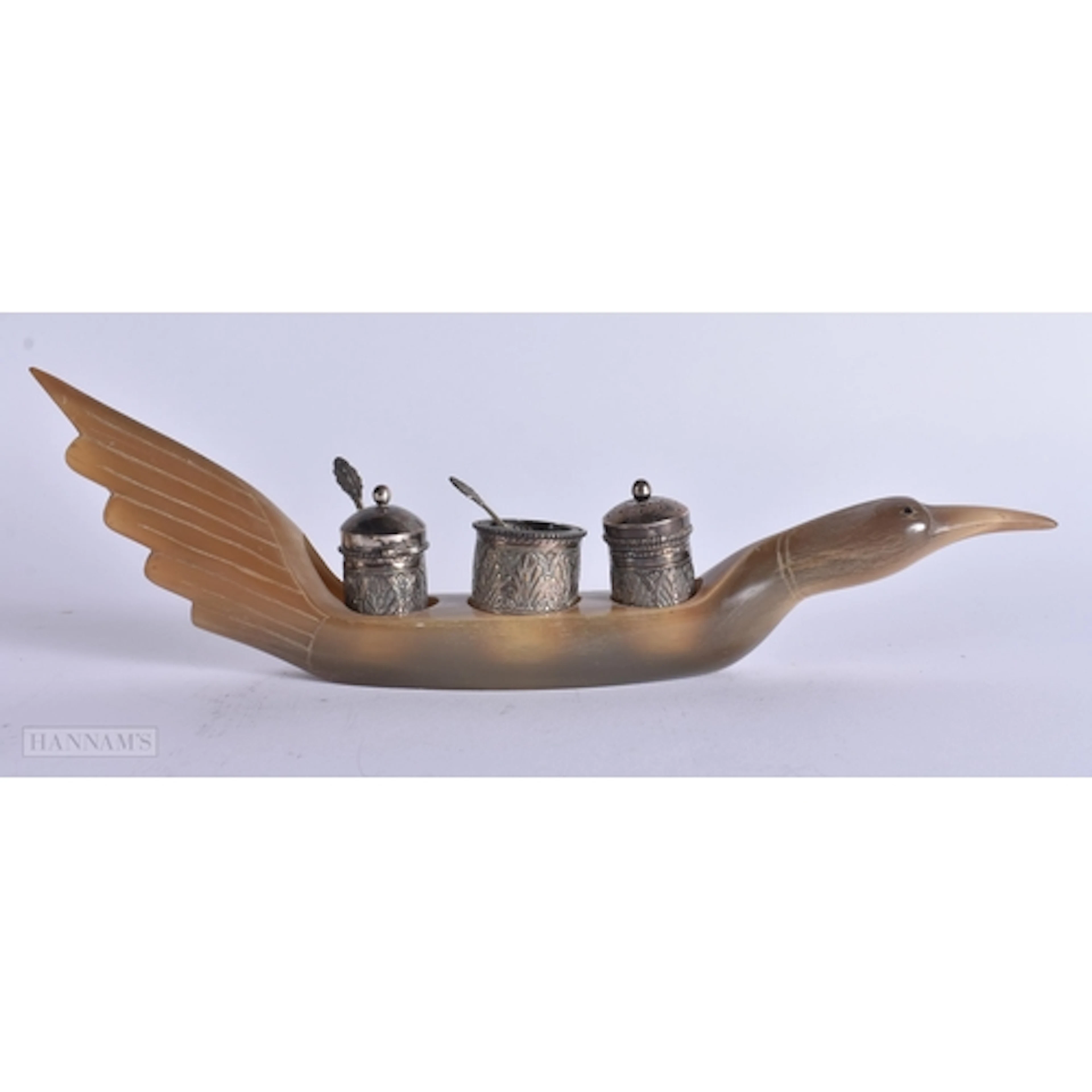 A LATE 19TH CENTURY ISLAMIC INDIAN CARVED HORN AND WHITE MET...