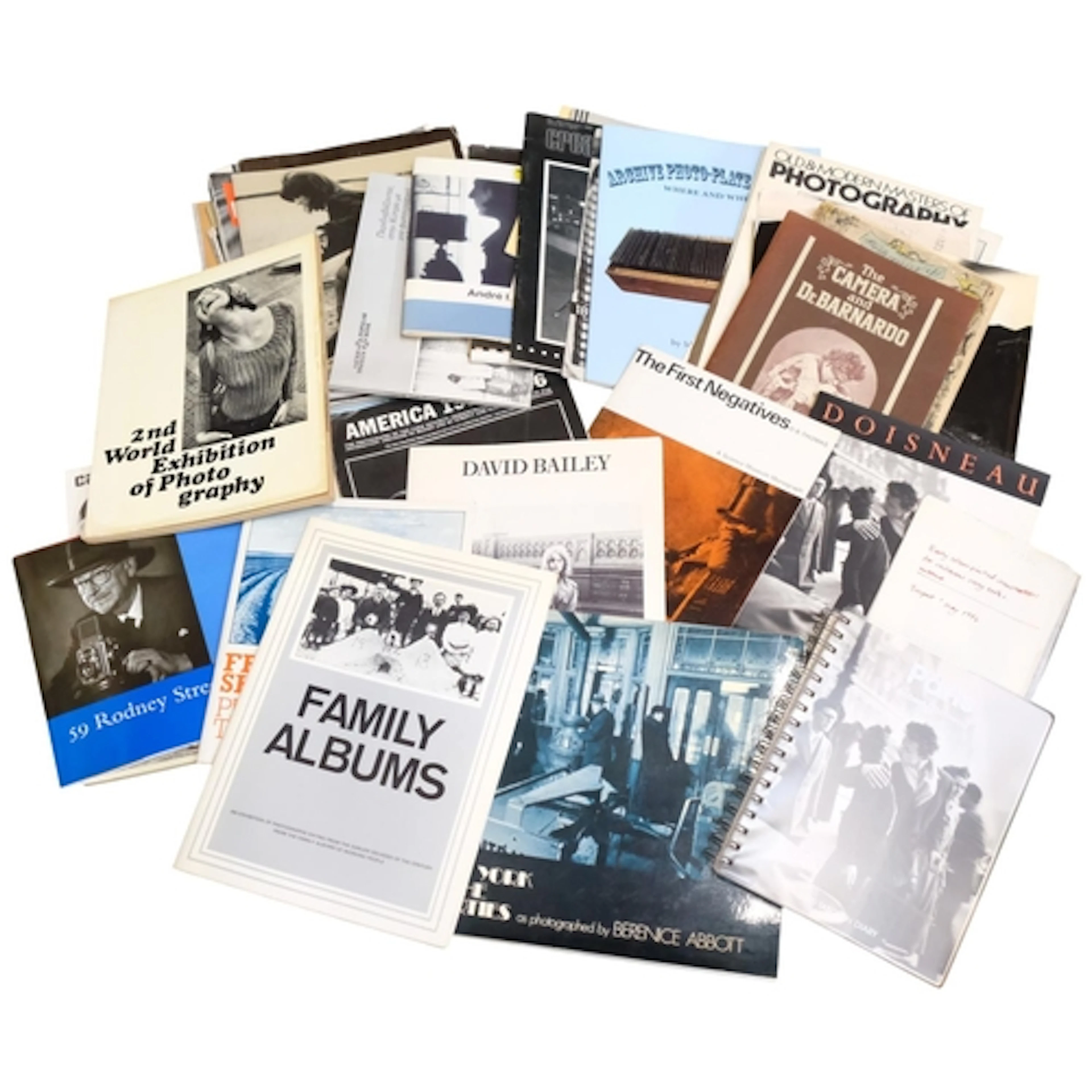 A collection of hardback photography books, including Apertu...