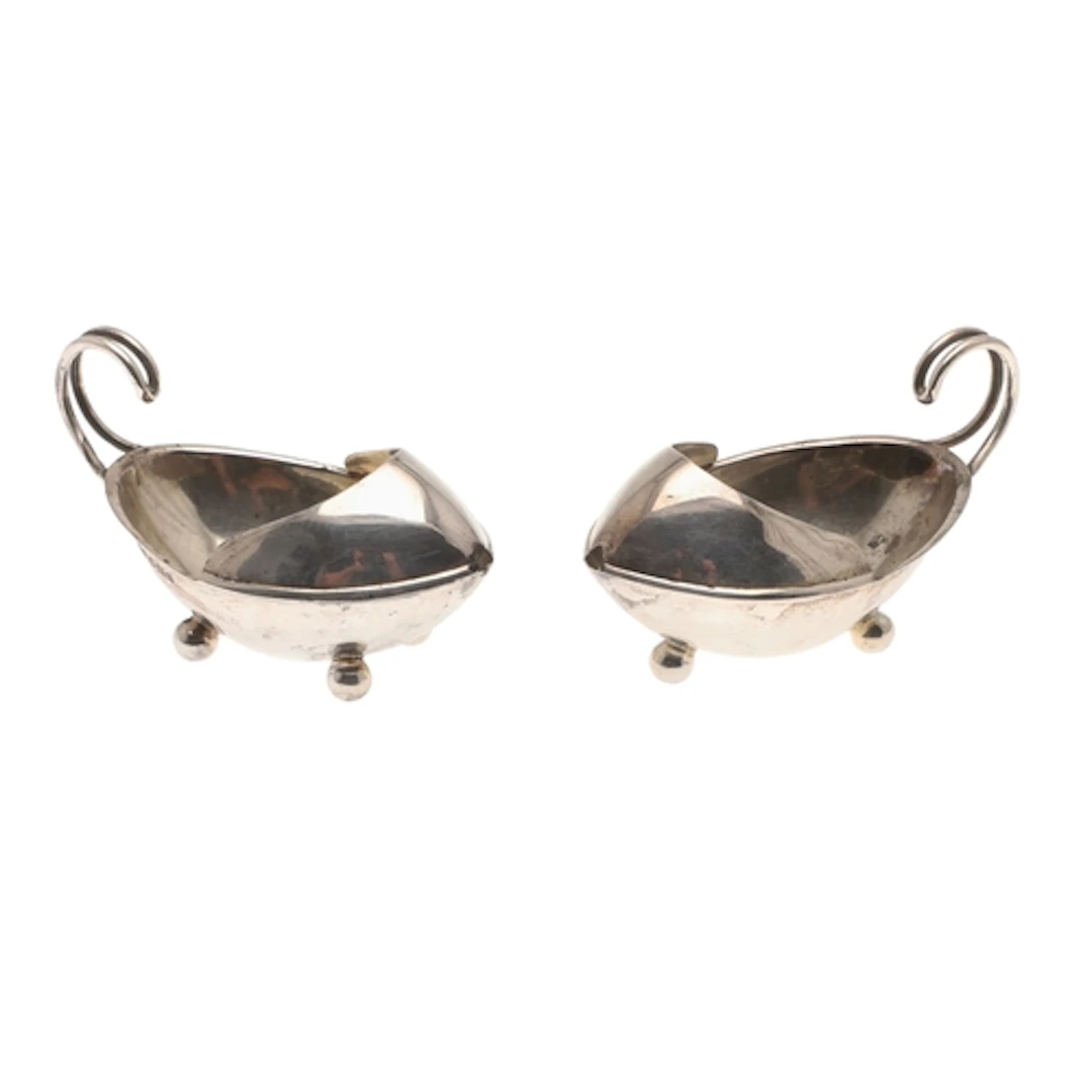 A PAIR OF EARLY 20TH CENTURY UNUSUAL SILVER MEDICINE FEEDERS...