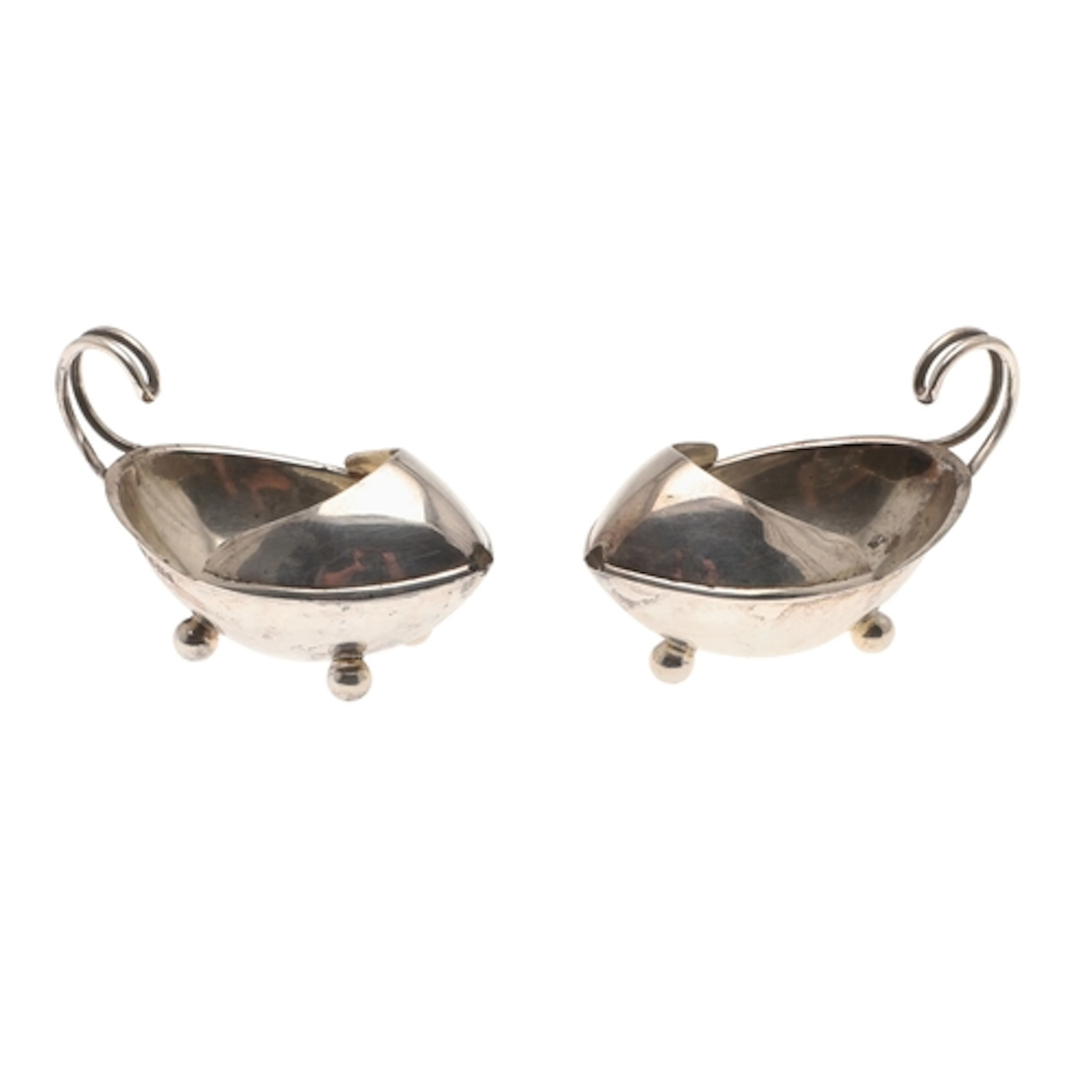A PAIR OF EARLY 20TH CENTURY UNUSUAL SILVER MEDICINE FEEDERS...