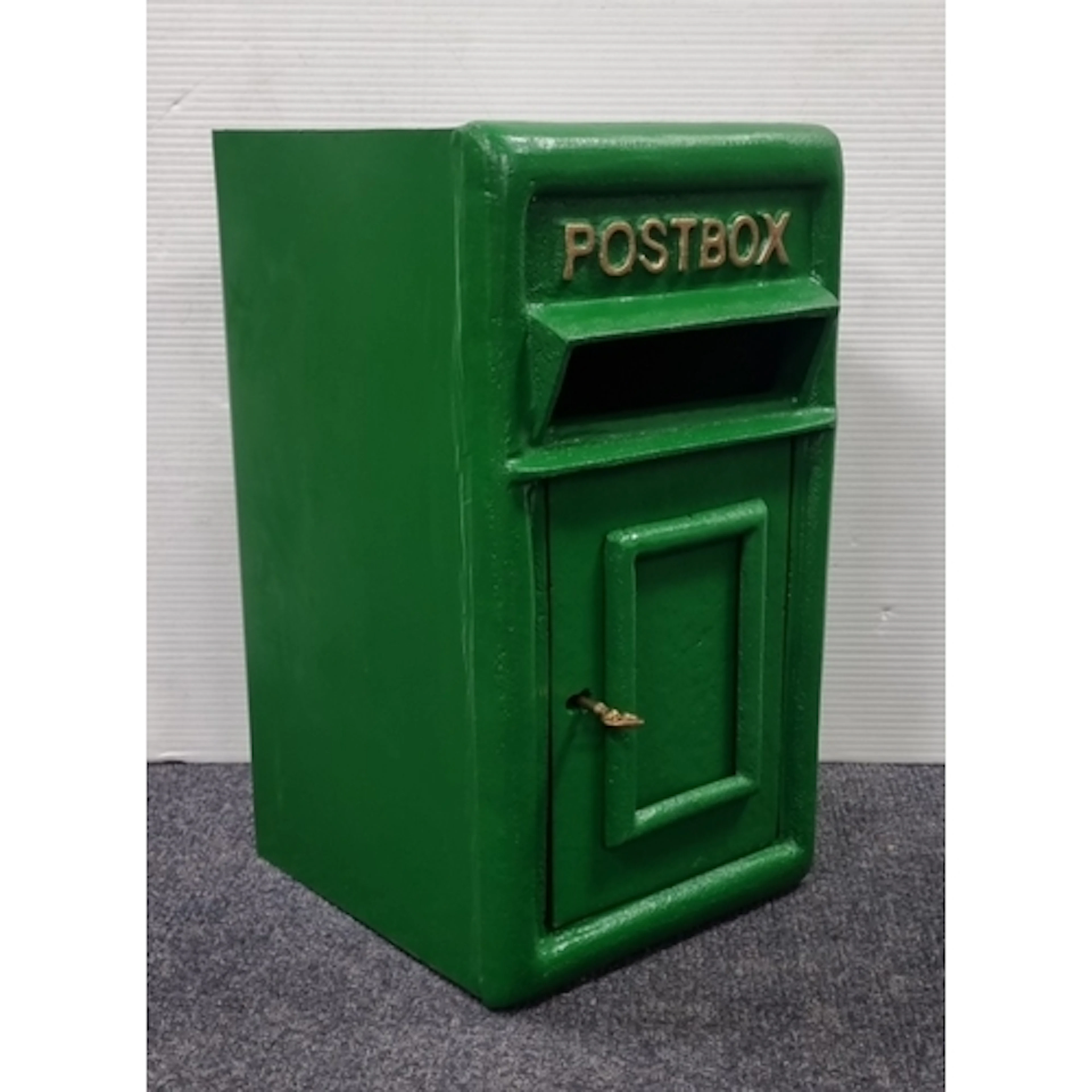 Green-painted cast-iron wall-mounted post box with two keys;...
