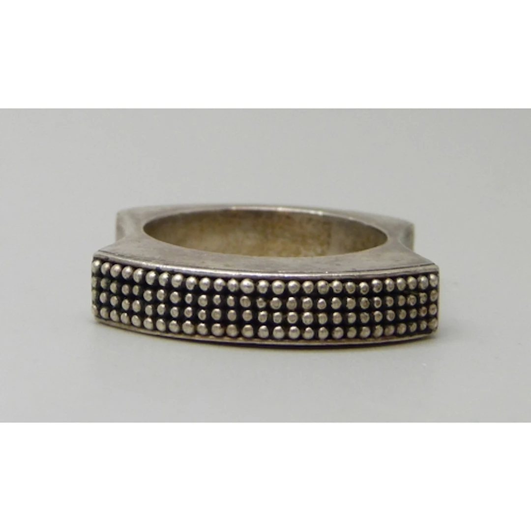 A chunky Modernist textured design silver ring, R.5