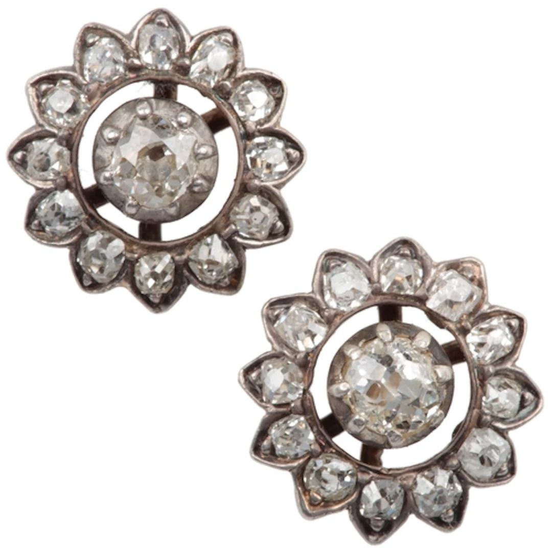 A pair of diamond earrings, late 19th century and later, eac...