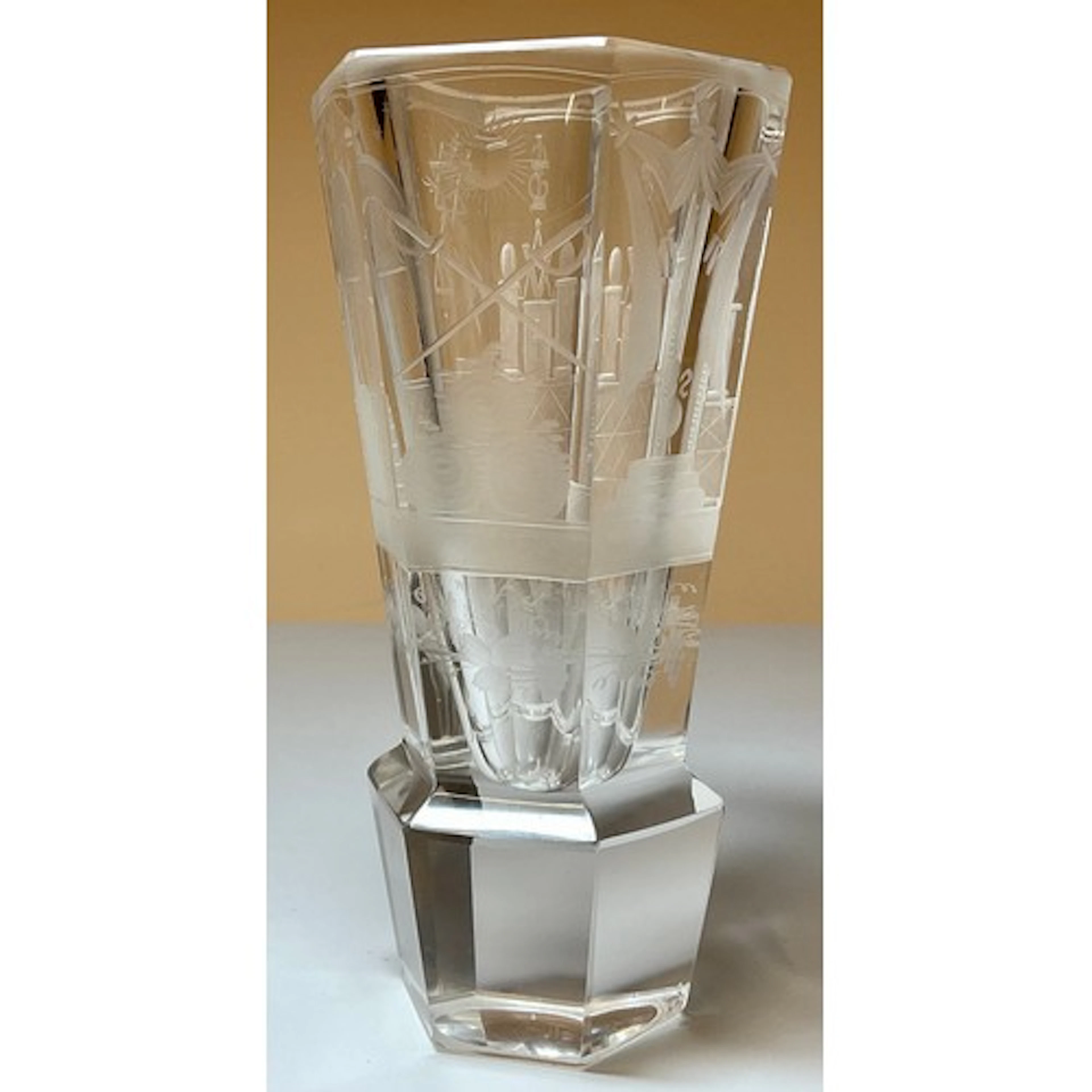 An early 20th century cut glass presentation beaker, the oct...