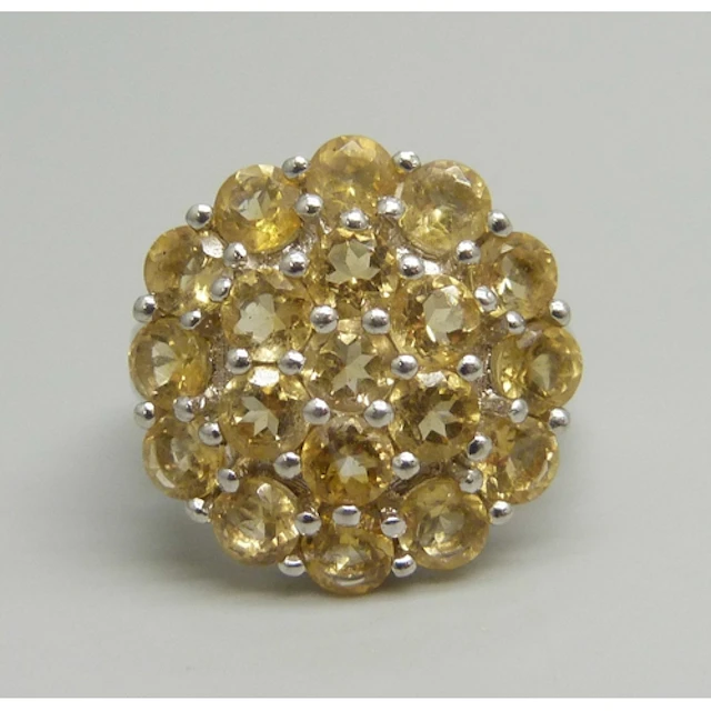 A TGGC statement silver and citrine cluster ring, N/O