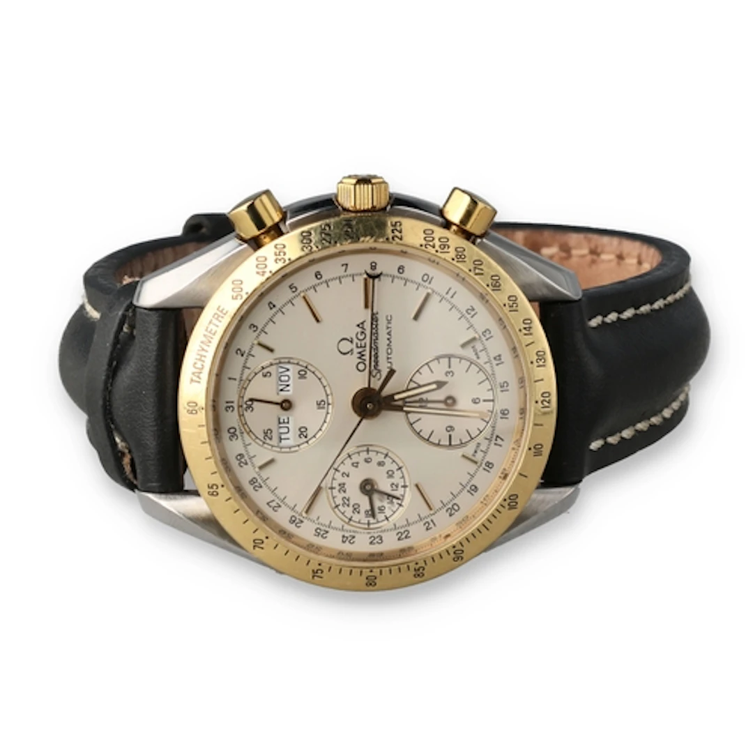 AN OMEGA STEEL AND GOLD SPEEDMASTER AUTOMATIC TRIP CALENDAR ...