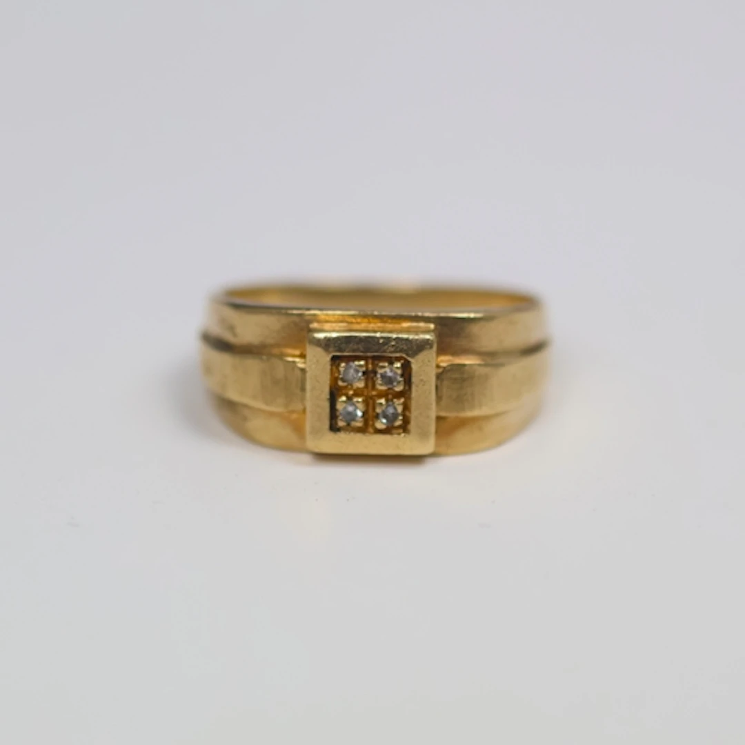 A continental 9ct gold diamond ring, the four round cut diam...