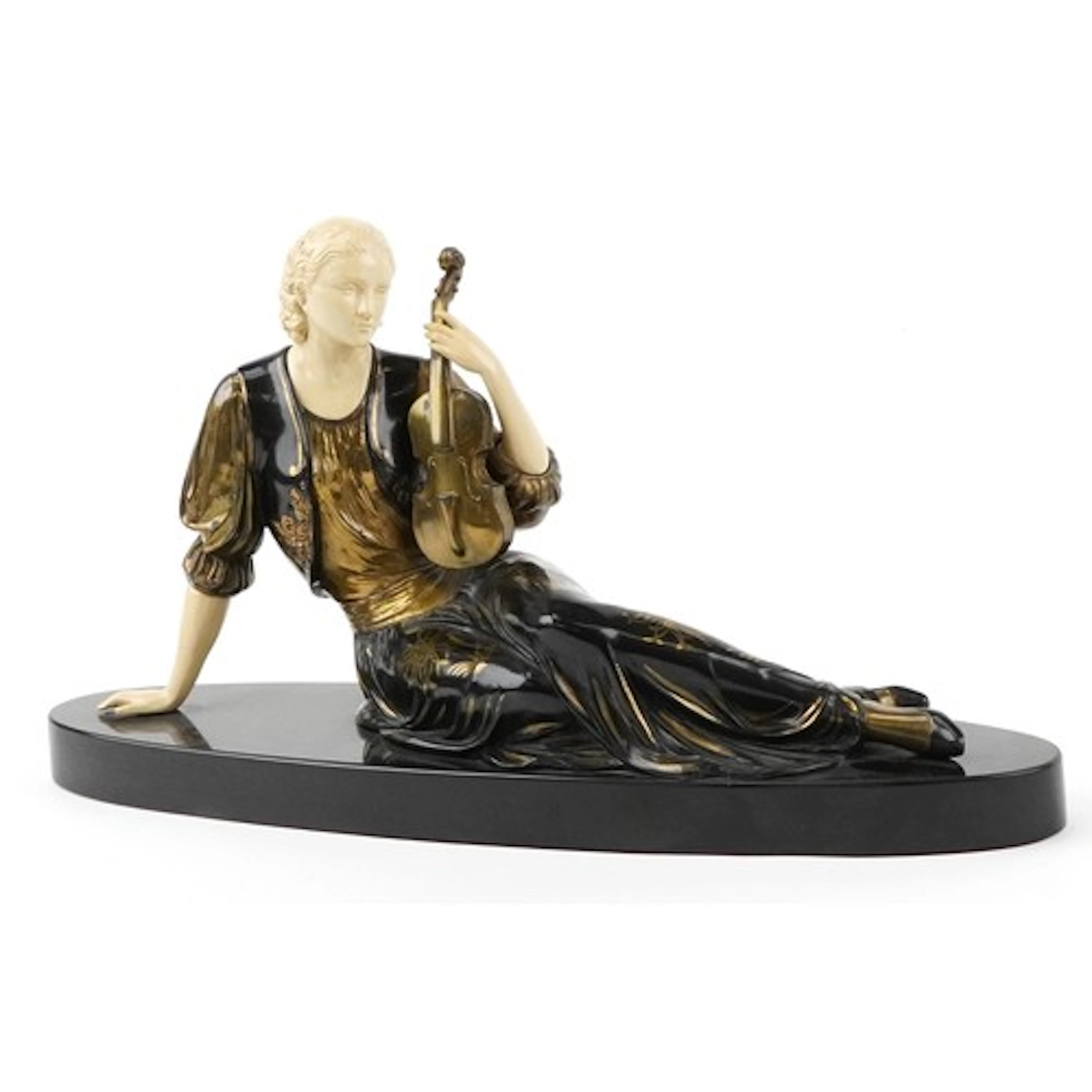 French Art Deco spelter and ivorine study of a recumbent fem...