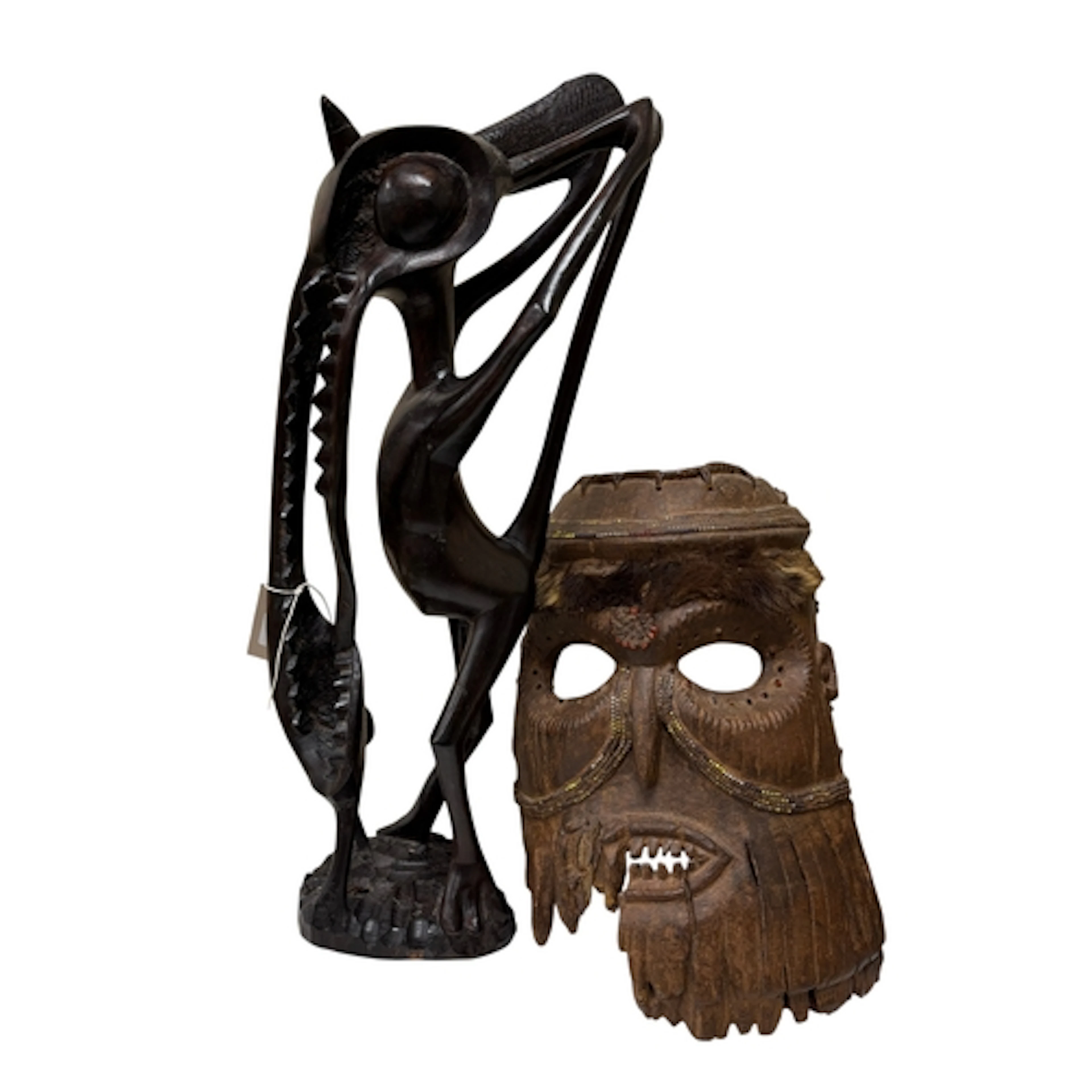 A beaded Tribal mask and Tanzania Makonde ebony tribal carvi...