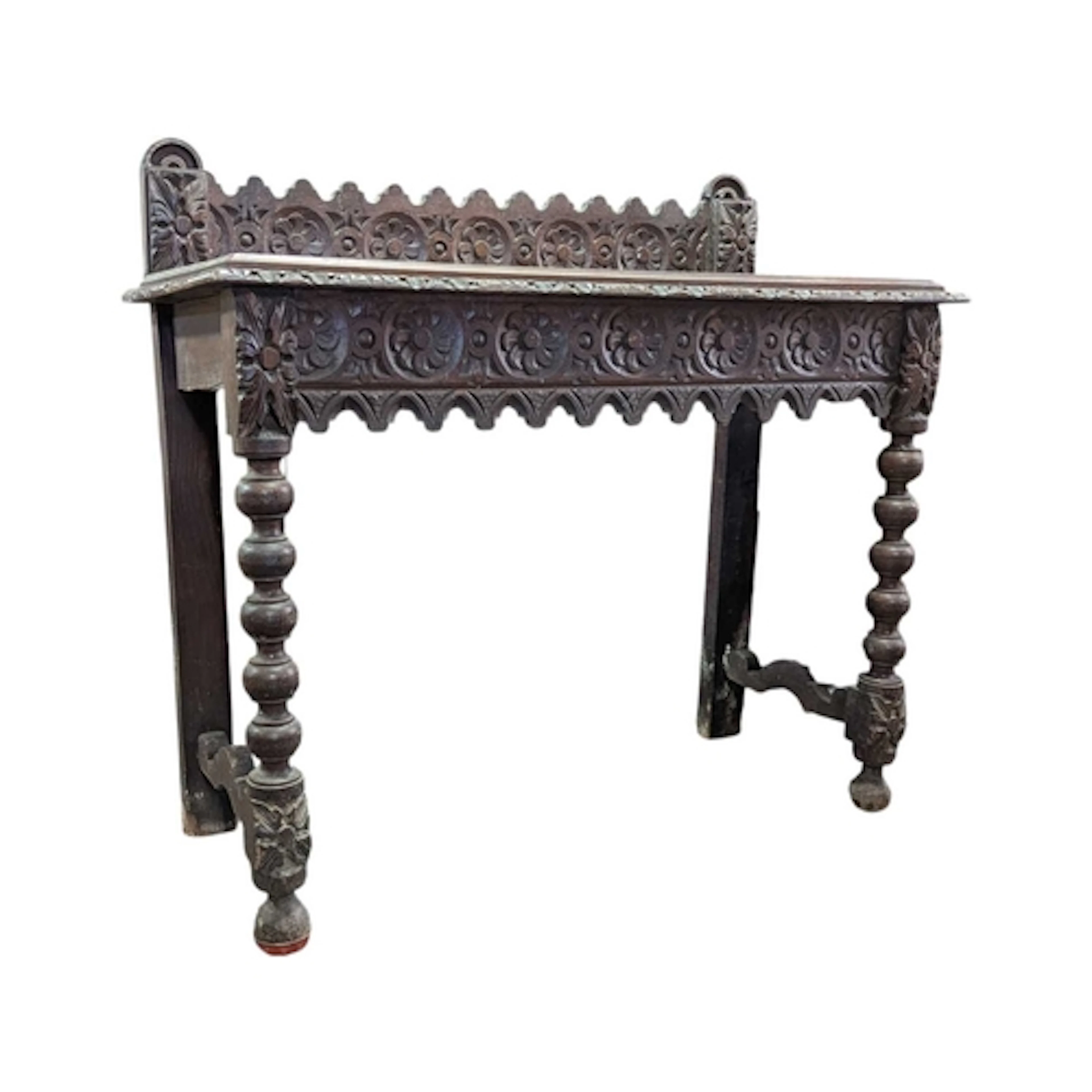 A late 19th century Jacobean Revival carved oak hall console...