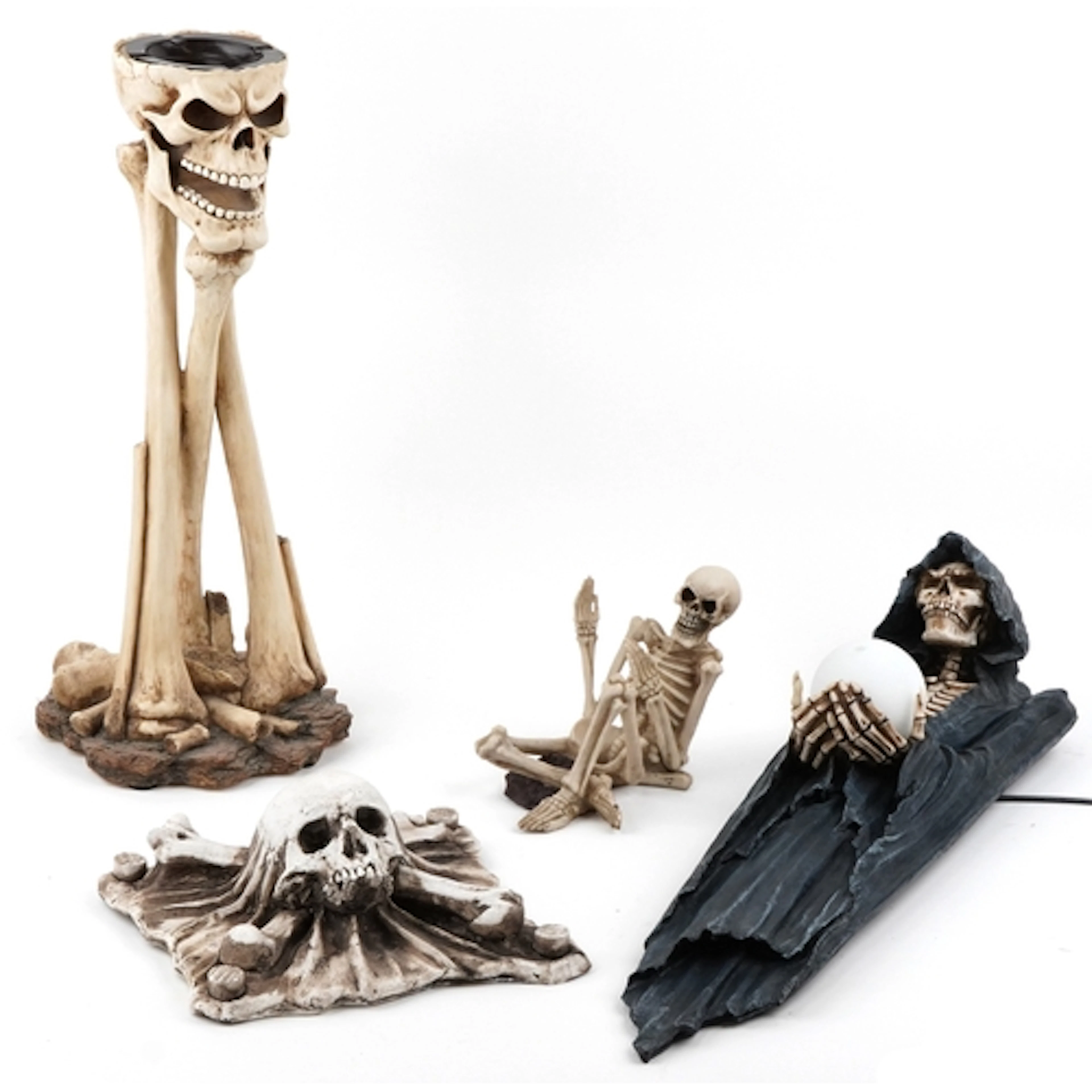 Collection of Gothic skeleton figures including a floor stan...