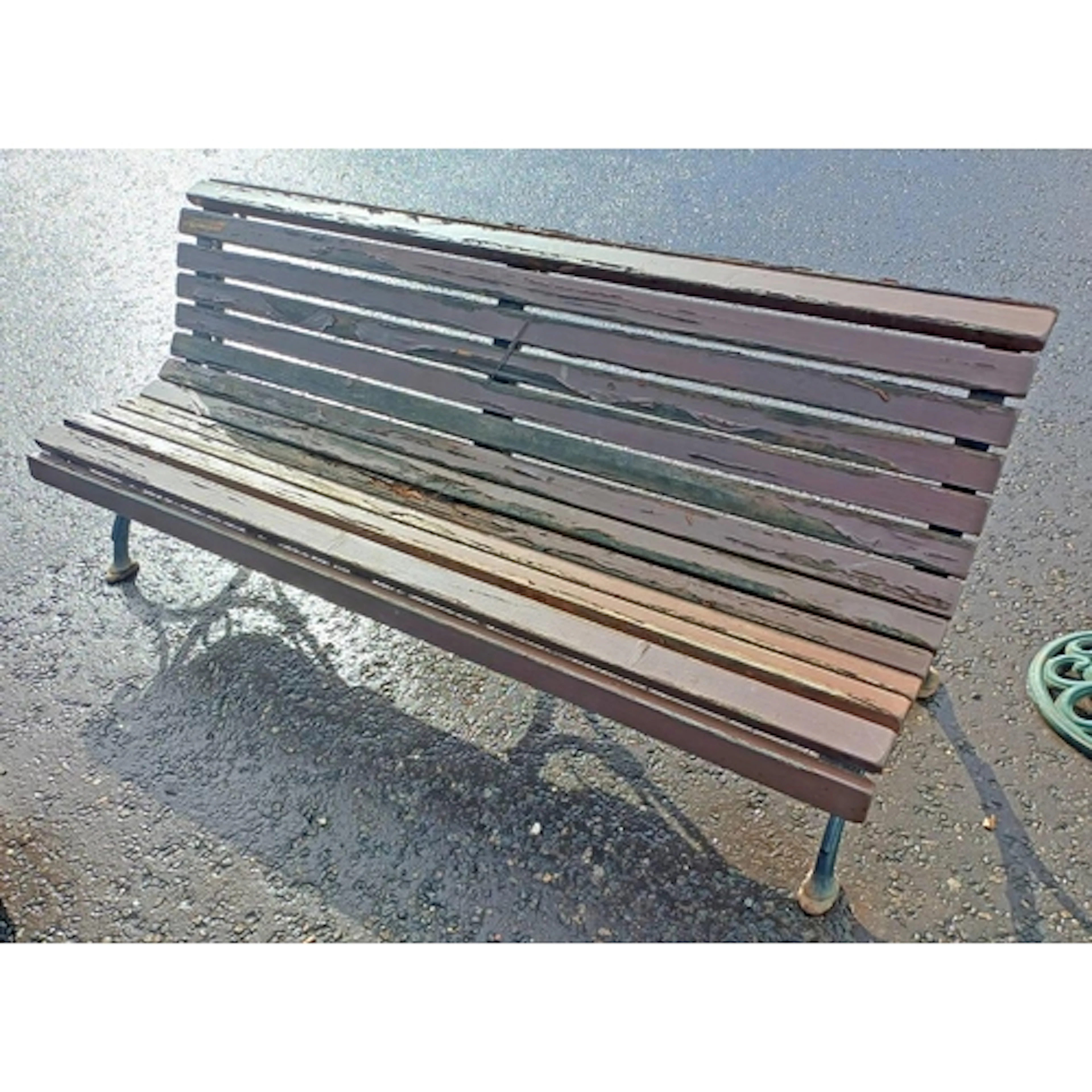 WOODEN GARDEN BENCH ON PAINTED CAST METAL SUPPORTS