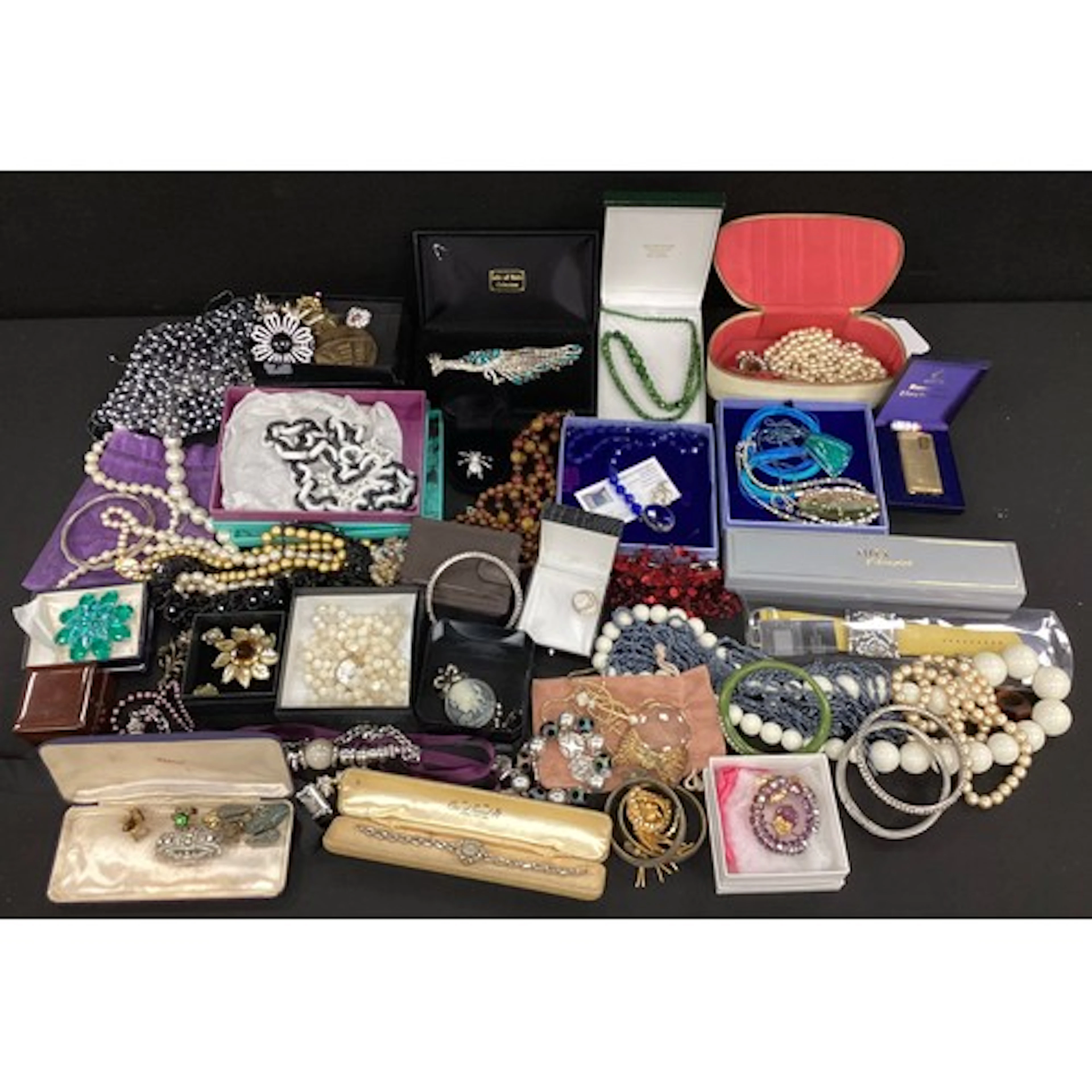A large selection of costume jewellery and watches, the cost...
