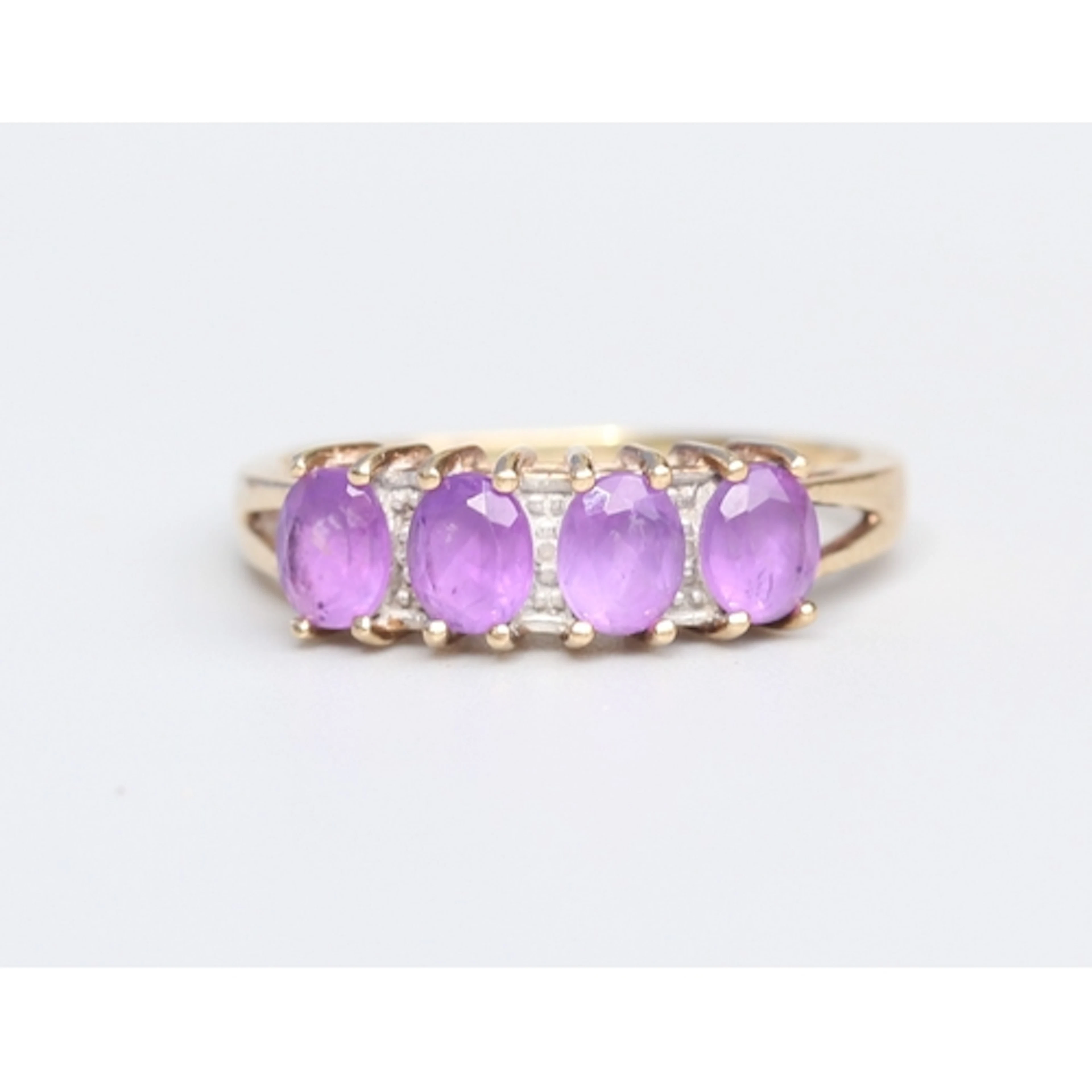 Amethyst Four Stone Set Ring with Diamond Inset Mounted in 9...