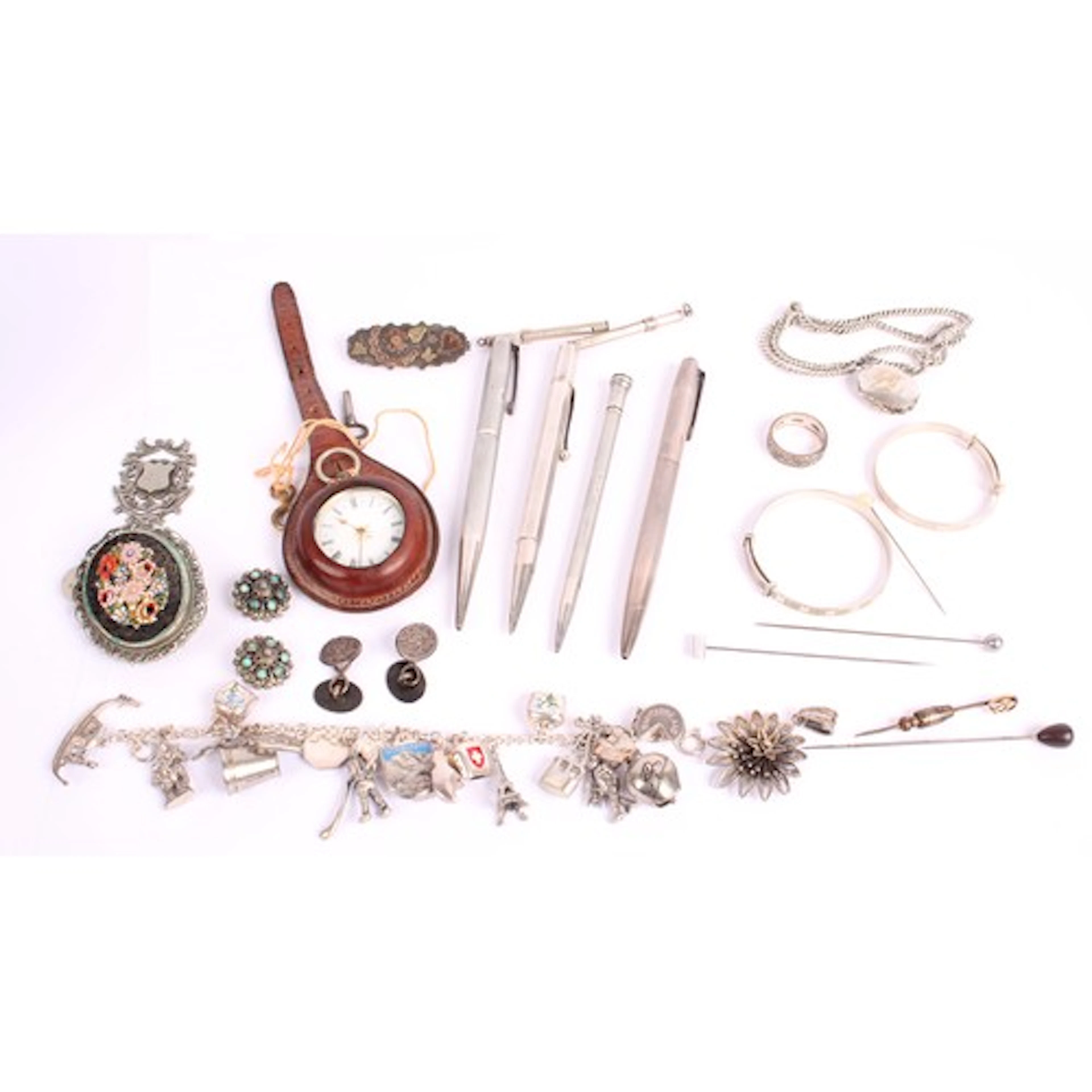 An Elizabeth II silver ball point pen, Birmingham 1964; anot...