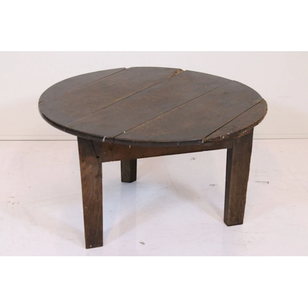 Late 18th/early 19th century oak table, having circular plan...