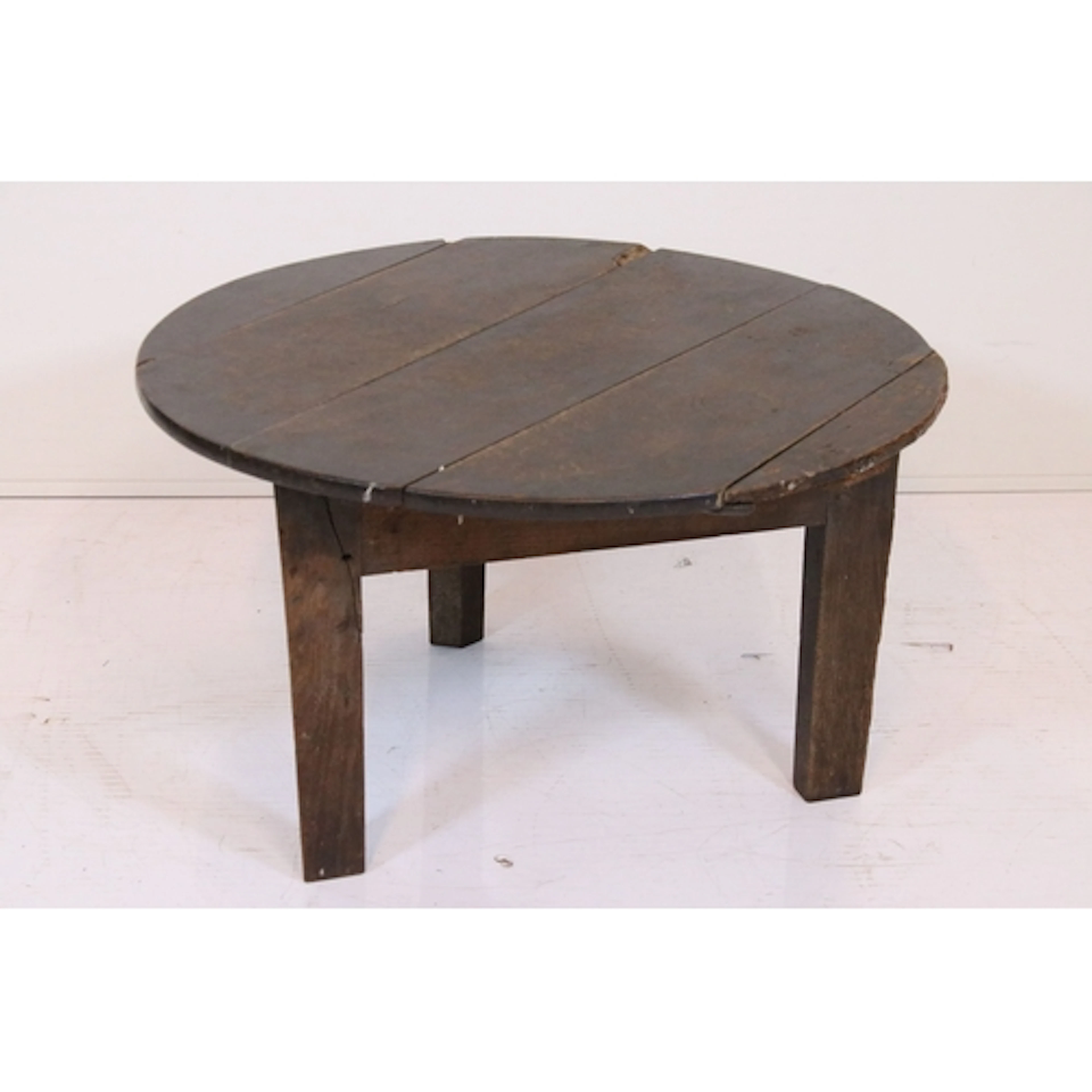 Late 18th/early 19th century oak table, having circular plan...