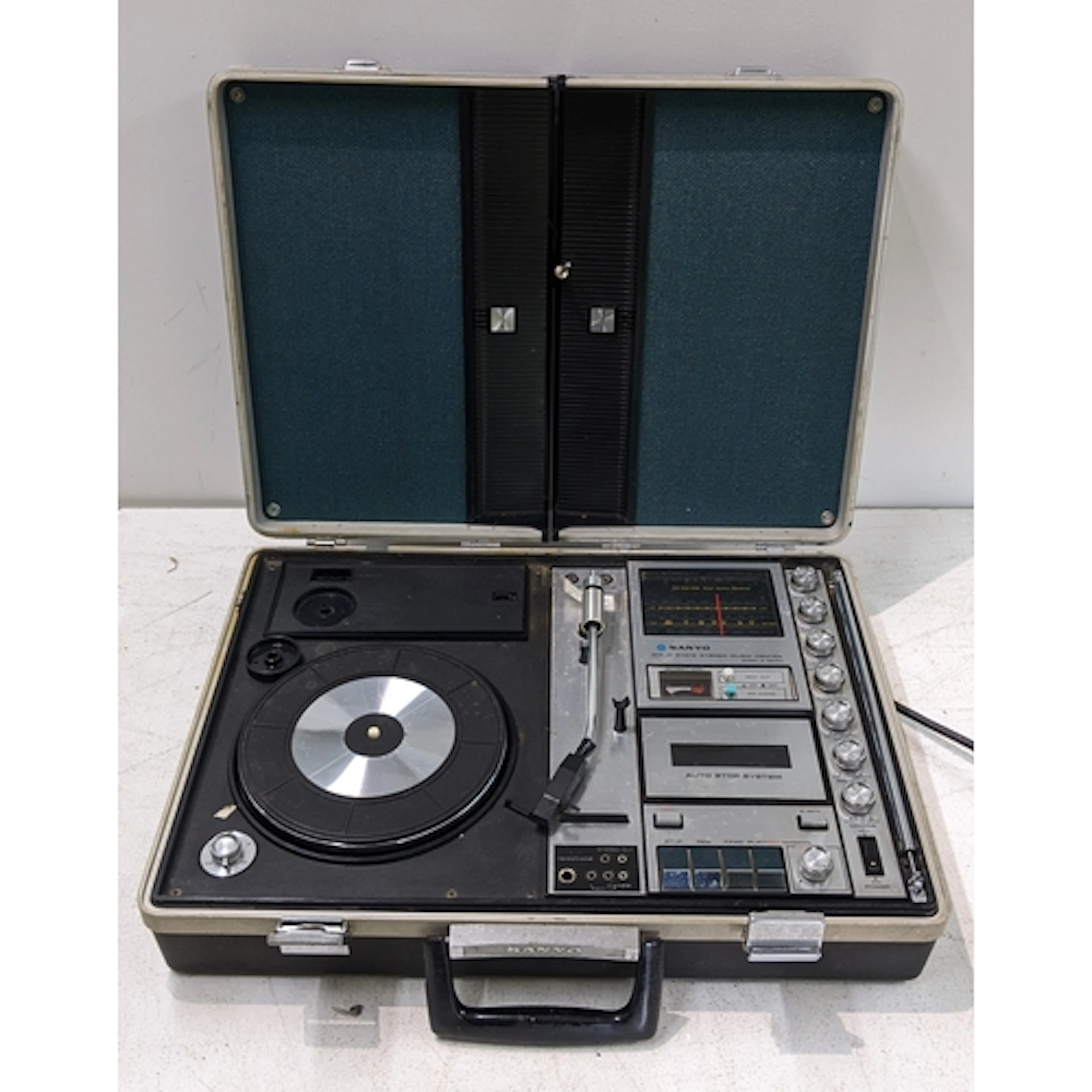 A portable 'Sanyo solid state stereo music center', model G-...