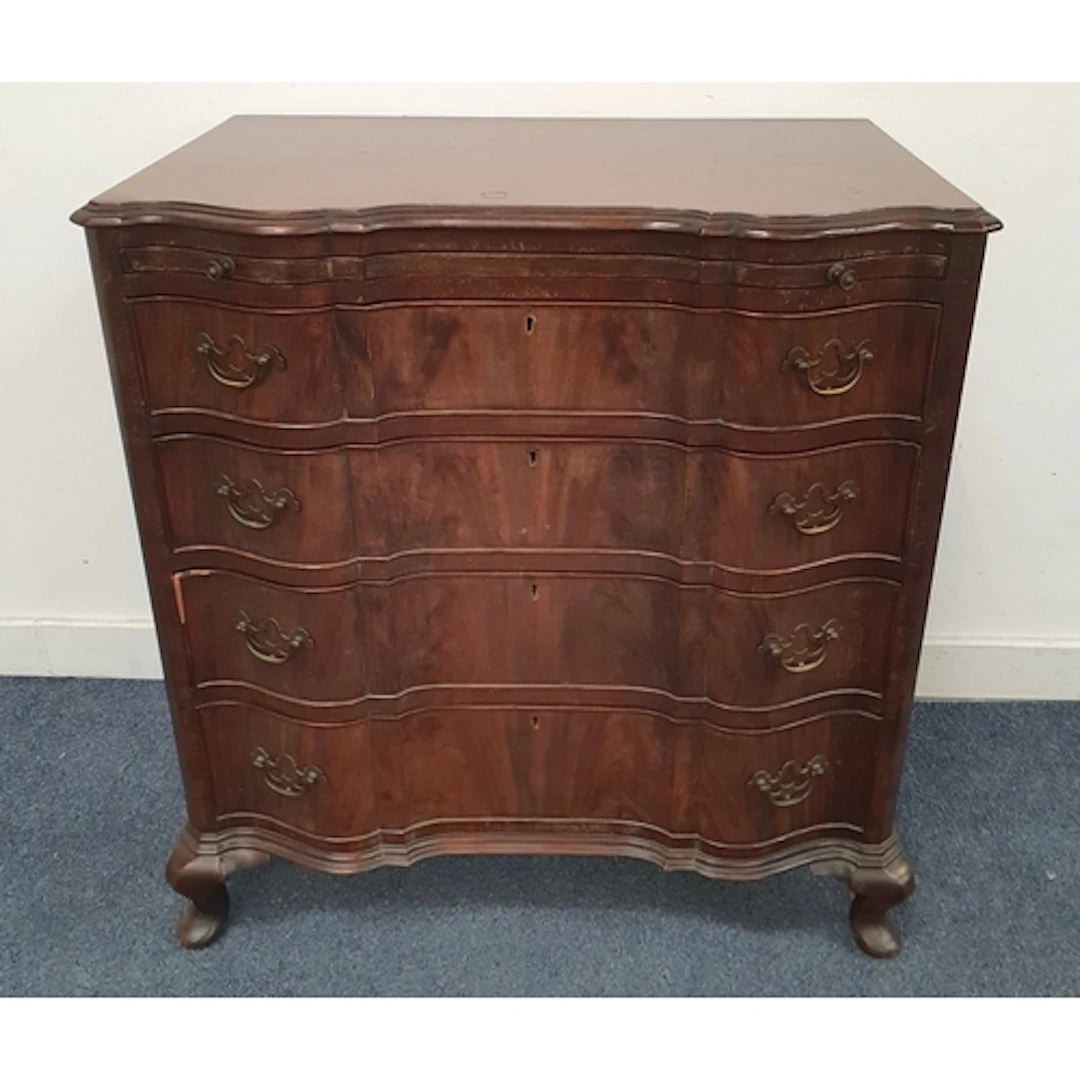 EDWARDIAN SERPENTINE-FRONT CHEST OF DRAWERS with brushing s...