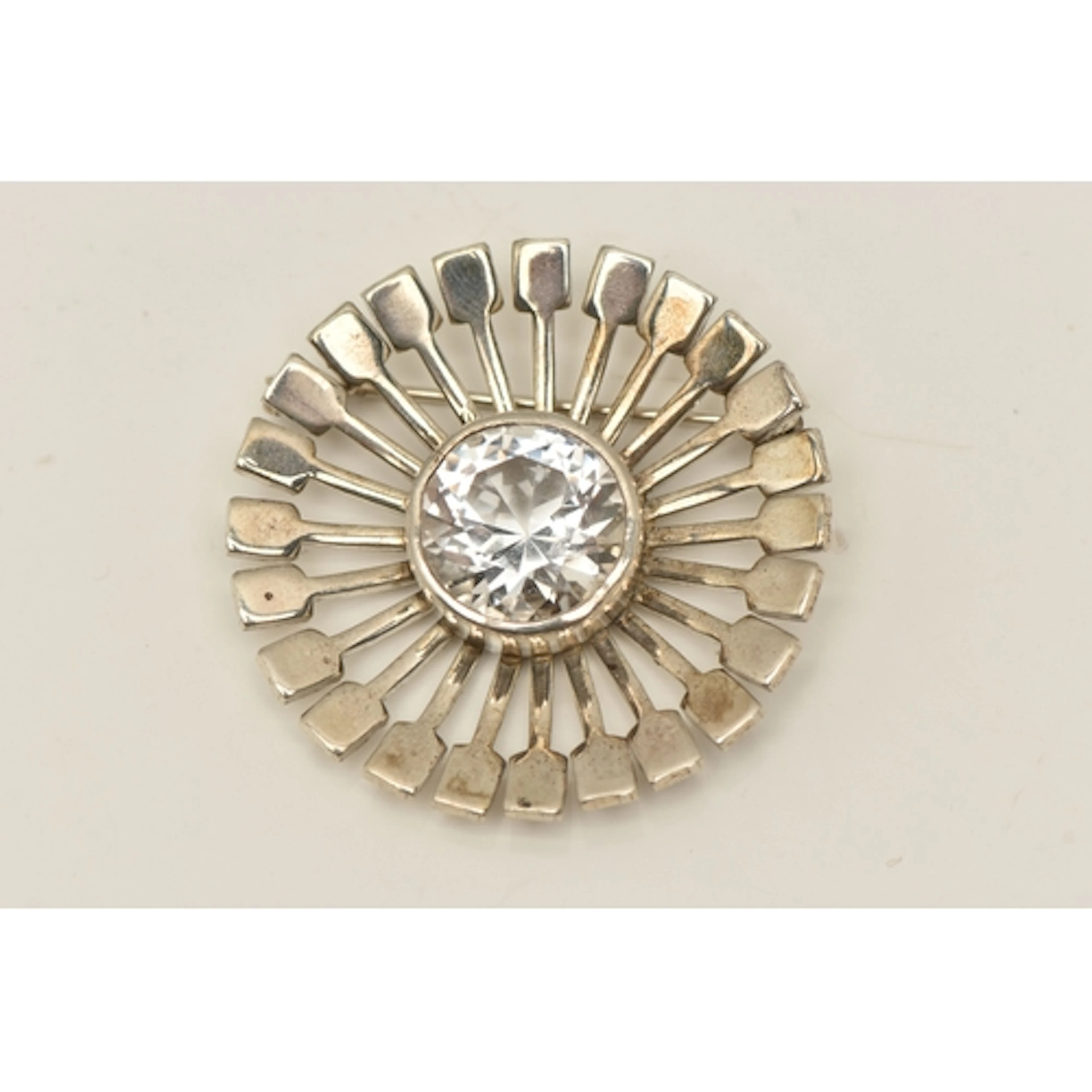A SWEDISH BROOCH, a Scandinavian design circular form brooch...