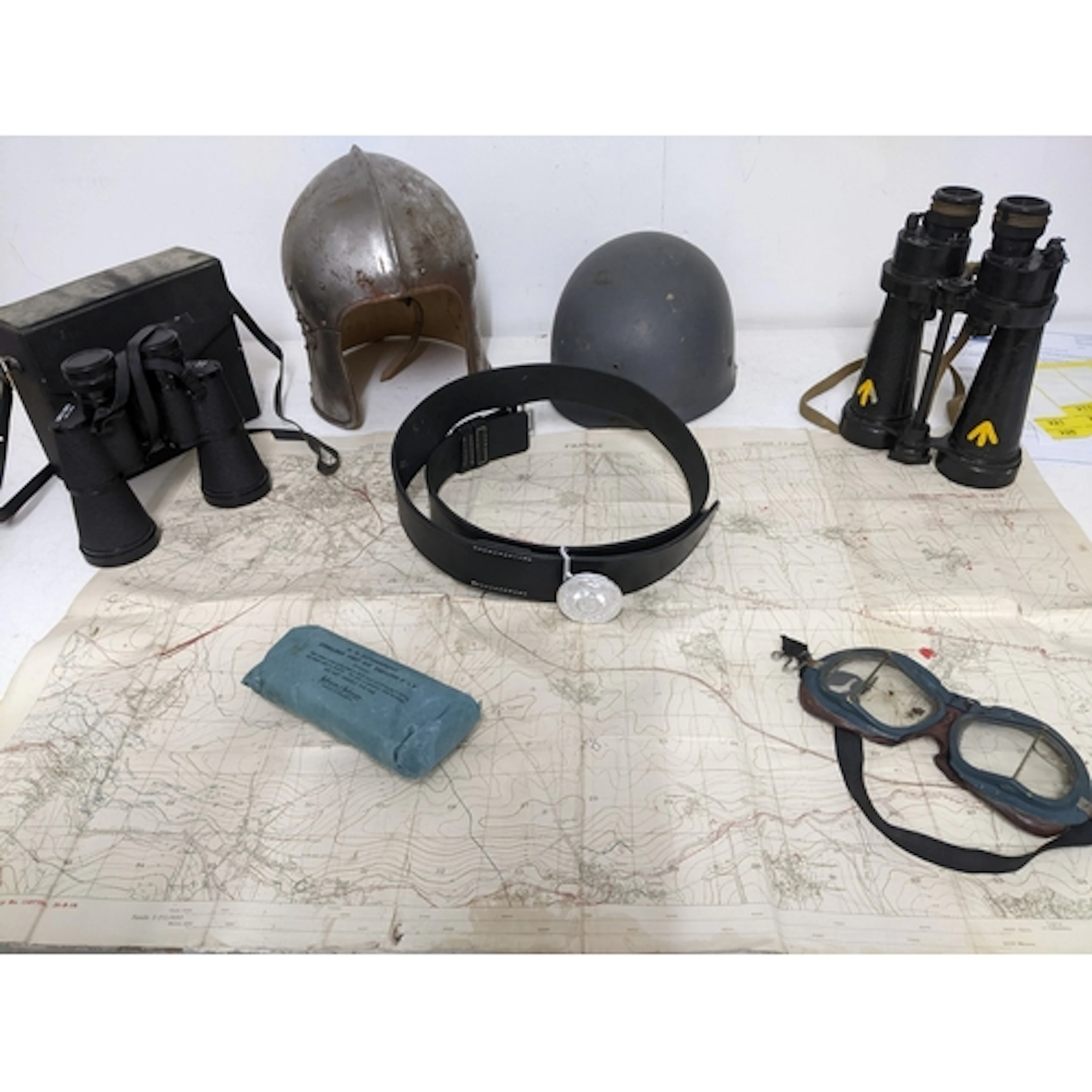 A group of military issue items to include a 1st world war t...