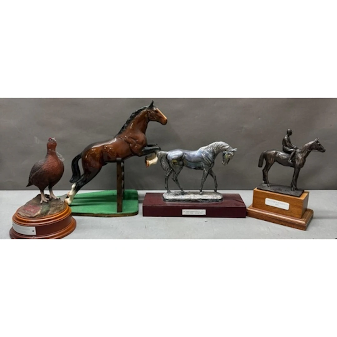 Horse racing interest. A selection of horse racing trophies ...