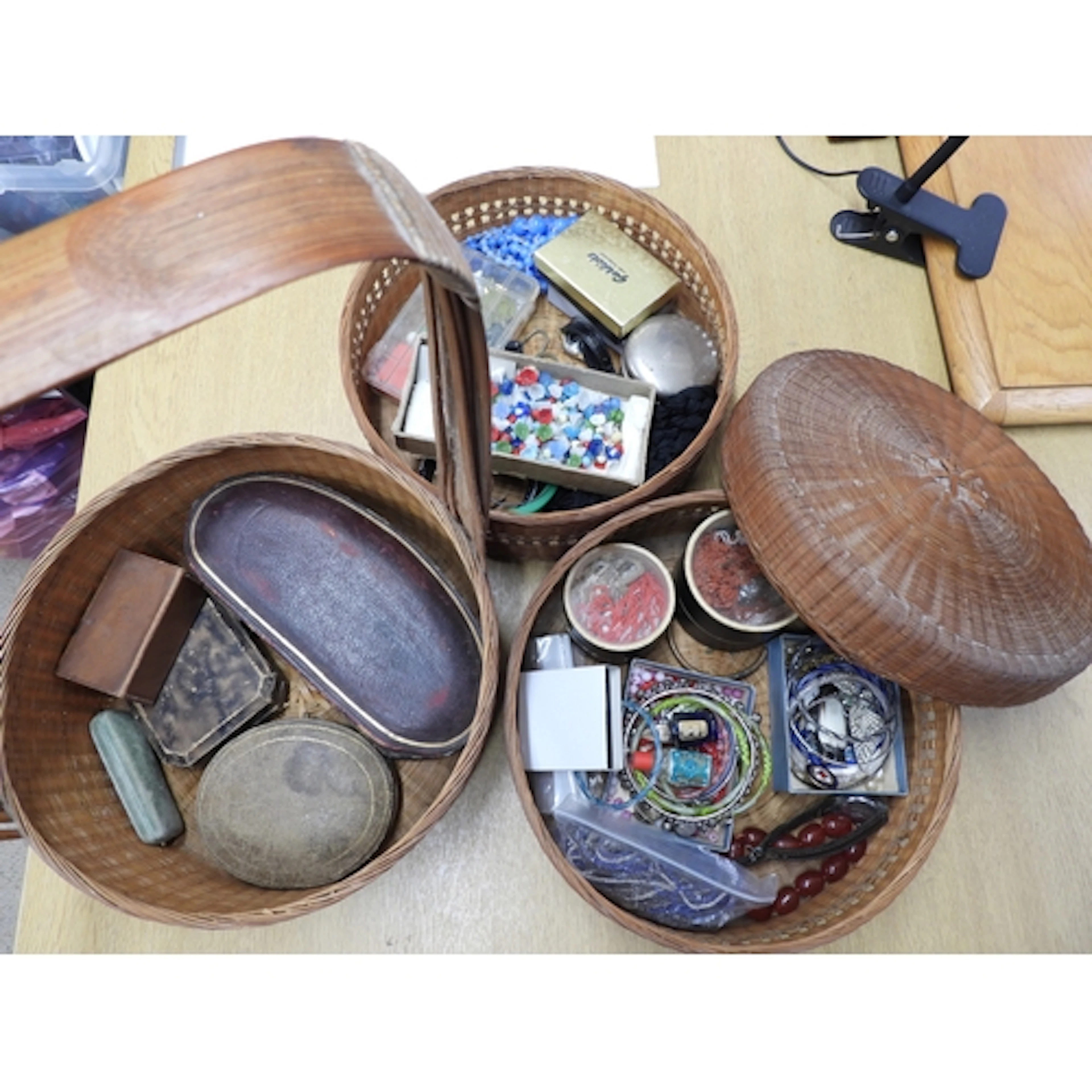 A Chinese bamboo steamer, full of vintage costume jewellery ...