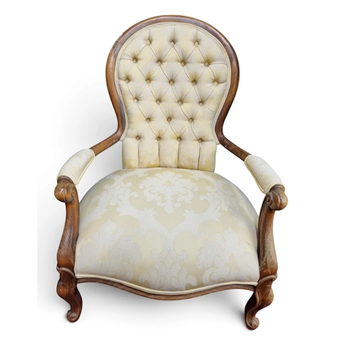 An early 20th Century Mahogany Salon Chair with deep buttone...