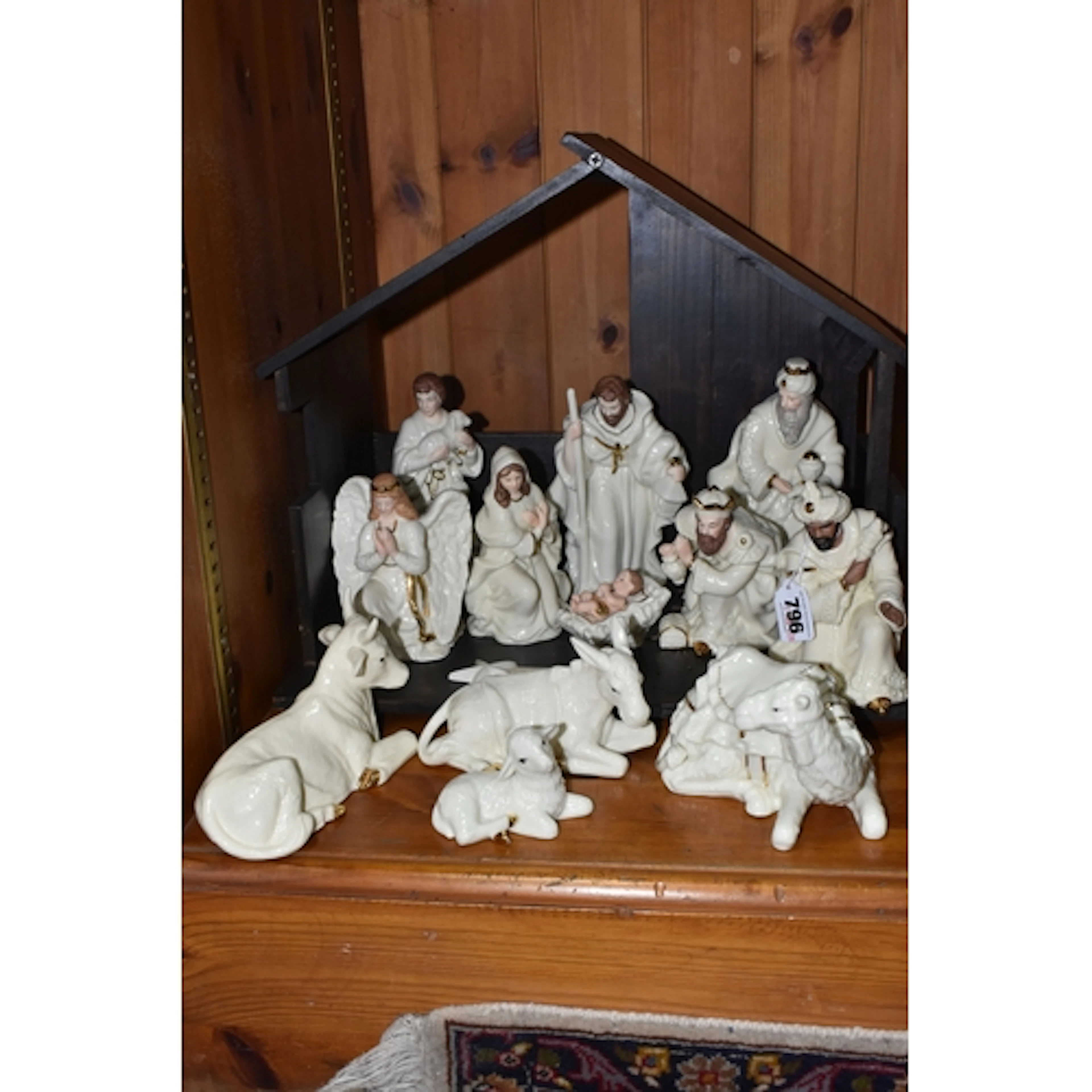 A BOXED BELLEEK LIVING NATIVITY SET, comprising wooden stabl...