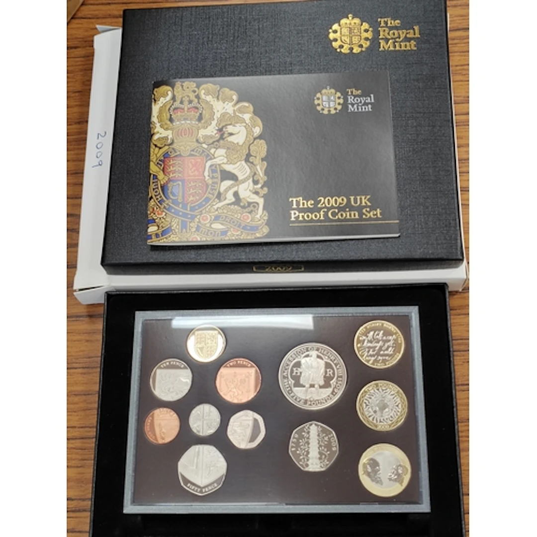 2009 proof cased set of 12 FDC, includes 2009 50p Kew Garden...