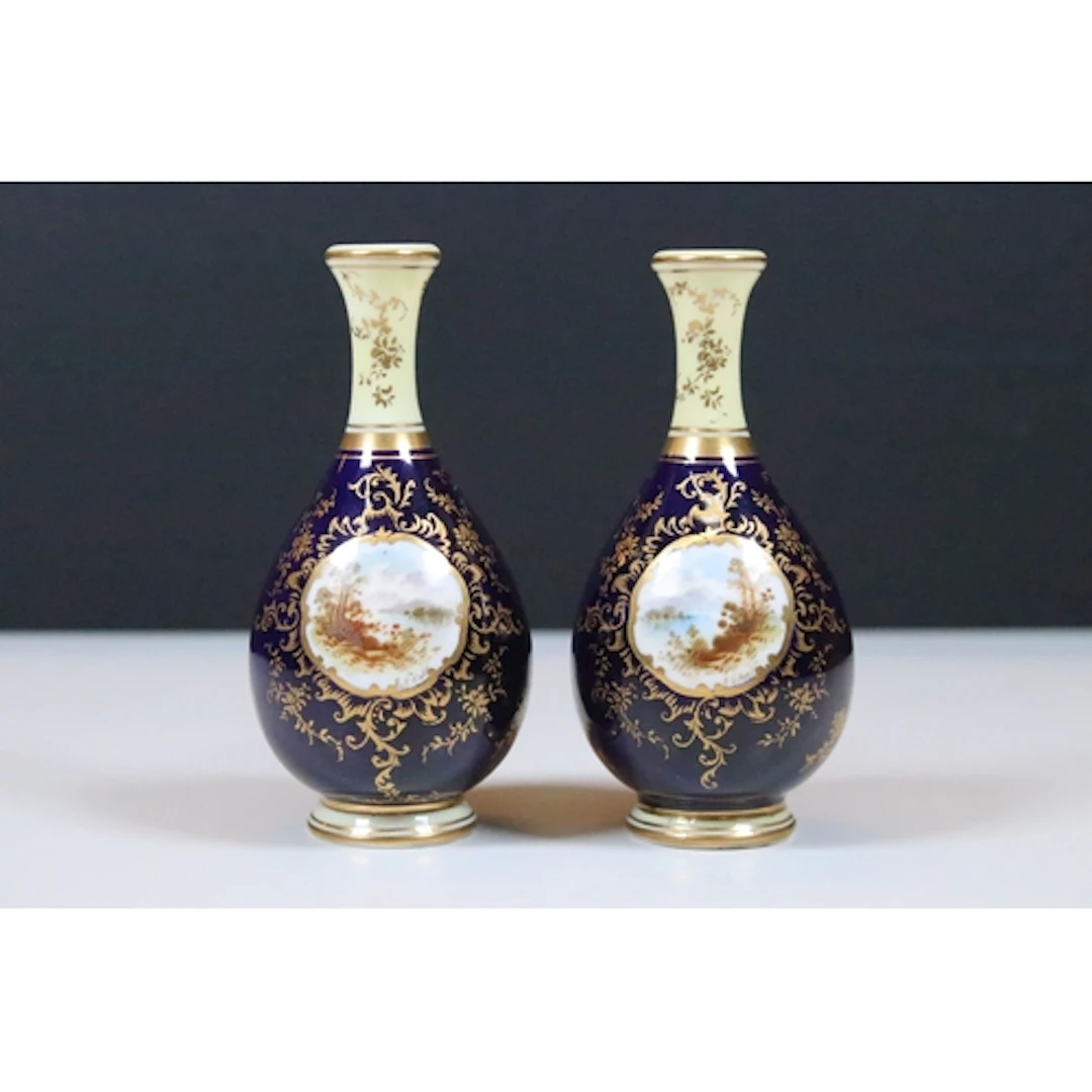Pair of miniature Coalport porcelain bottles vases, decorate...