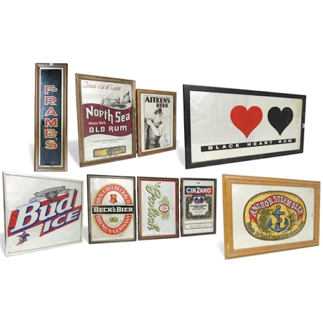 A collection of vintage pub mirrors, including Pernod, Marti...
