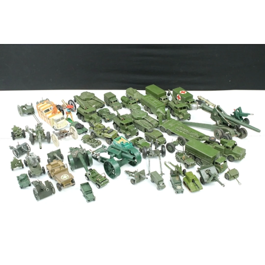 Around 50 mid 20th C play worn military diecast models to in...
