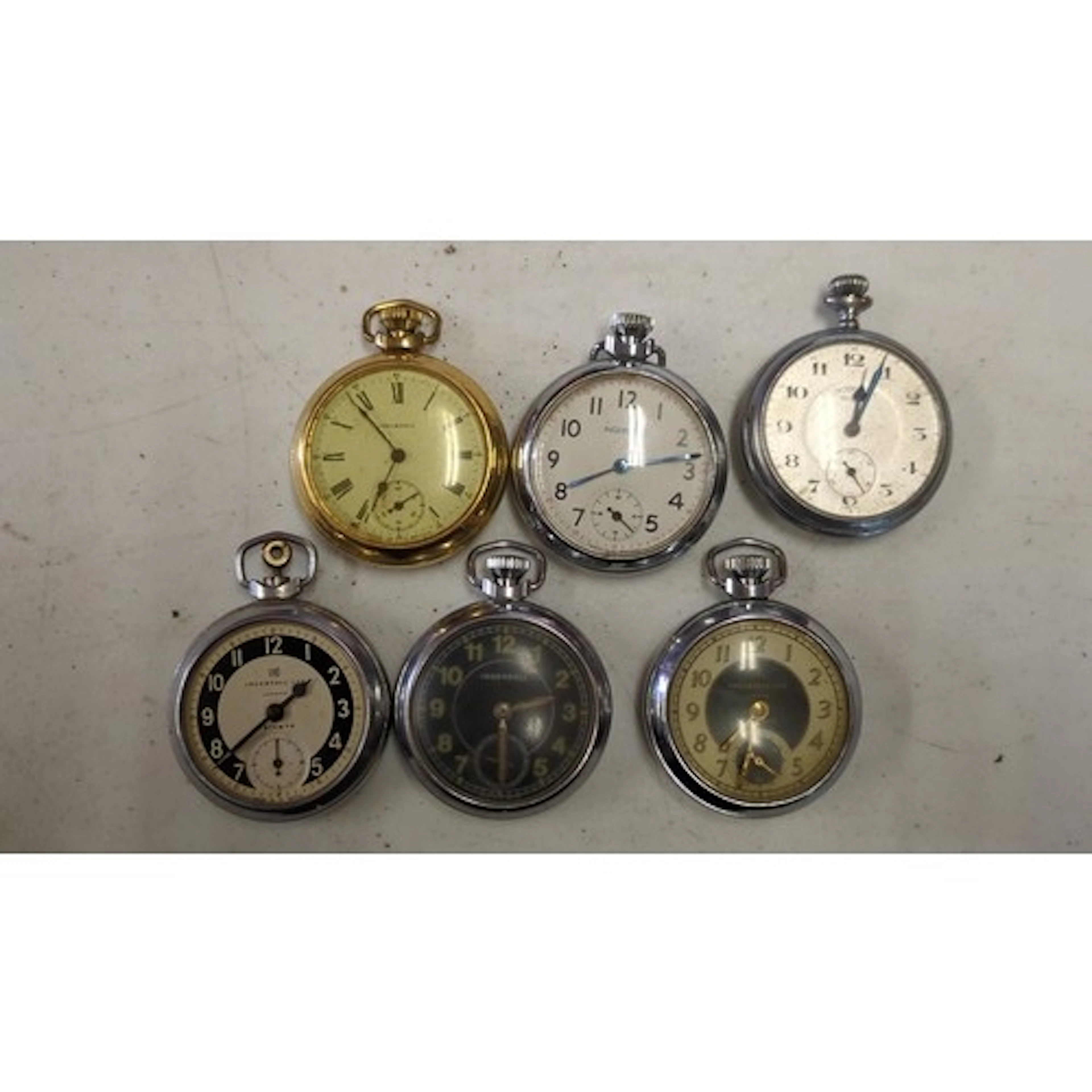 A quantity of open-face pocket watches, various dial designs...