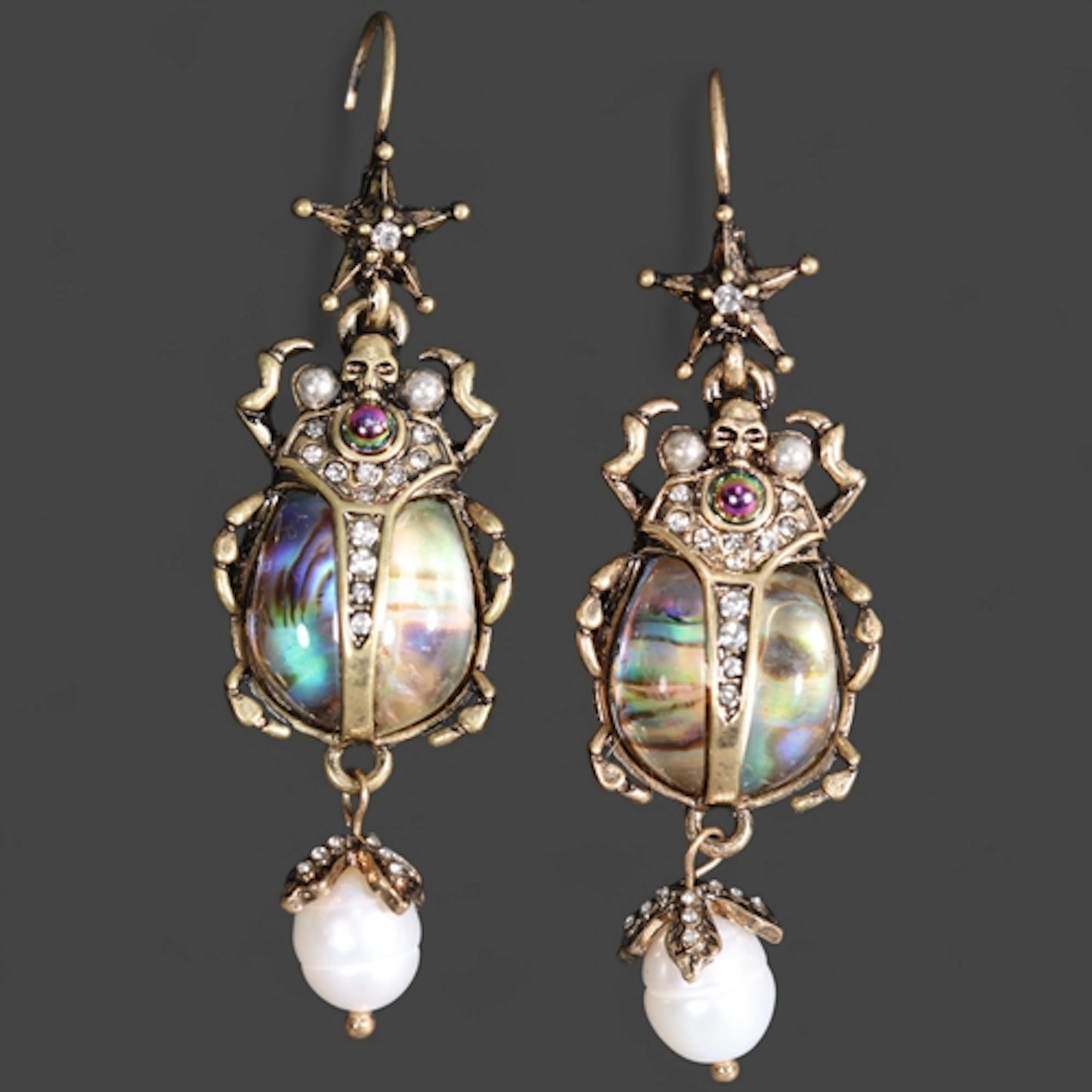 Jewellery: Alexander McQueen style costume jewellery earring...