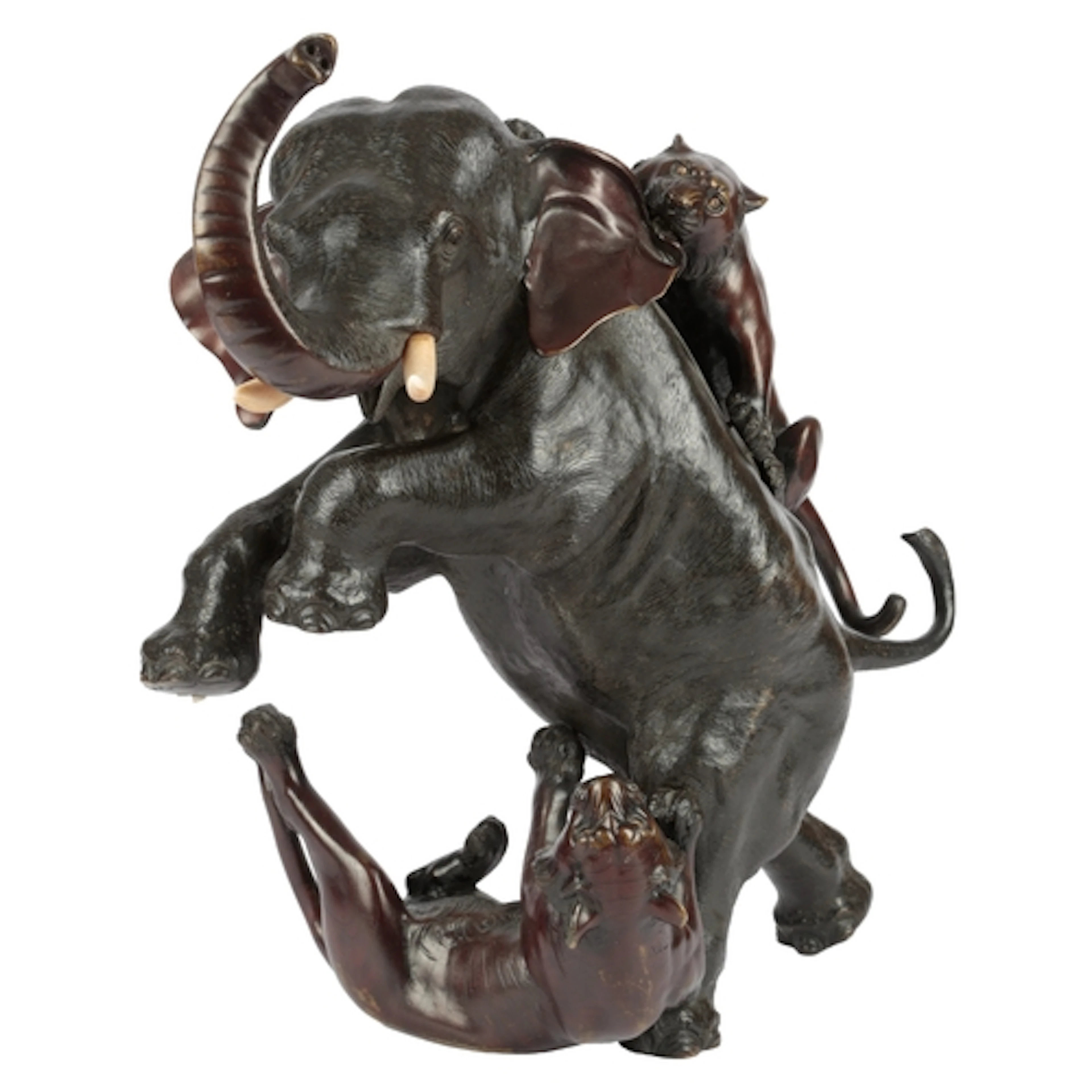 A large Japanese bronze okimono of tigers attacking an eleph...