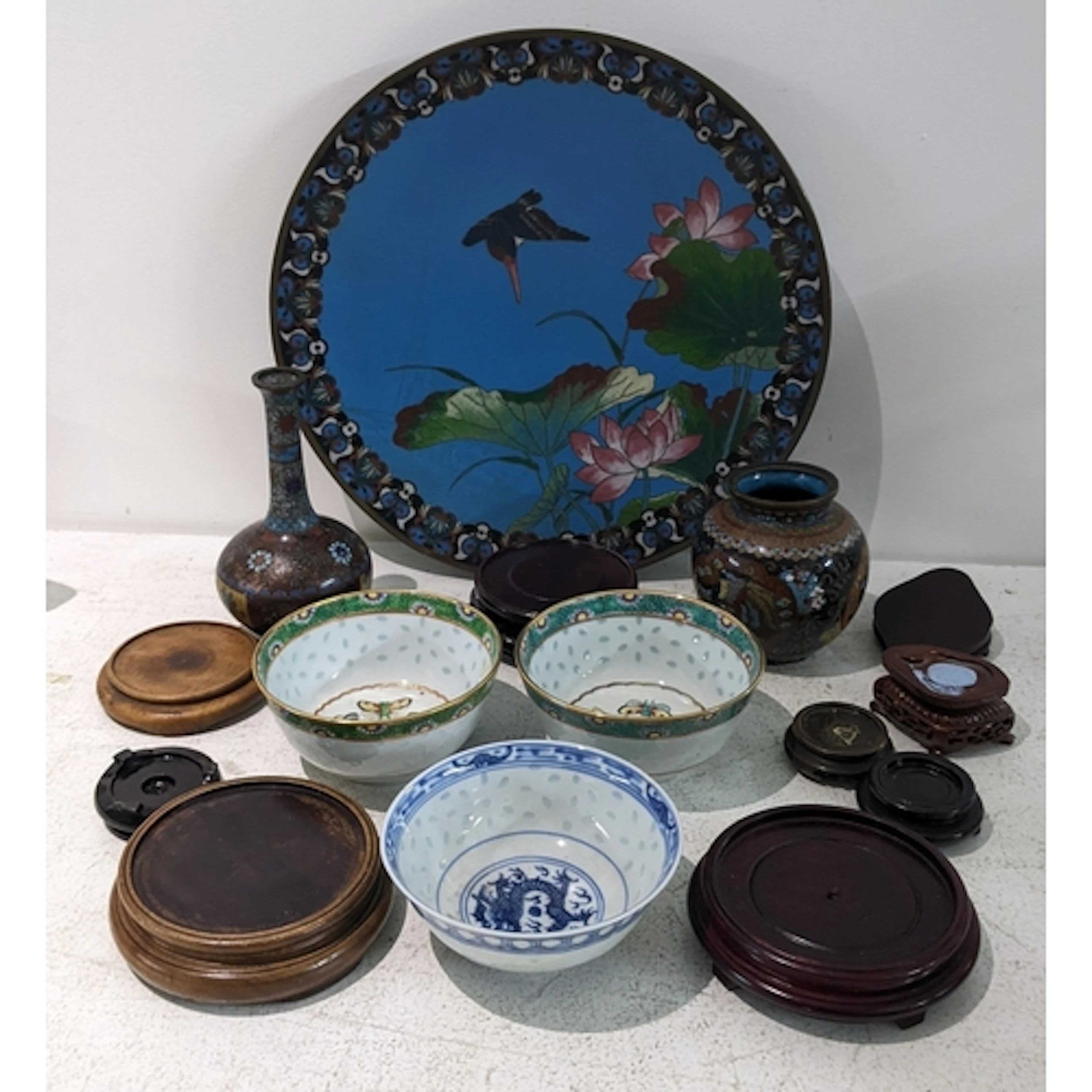 An early 20th century Japanese cloisonne charger and two vas...